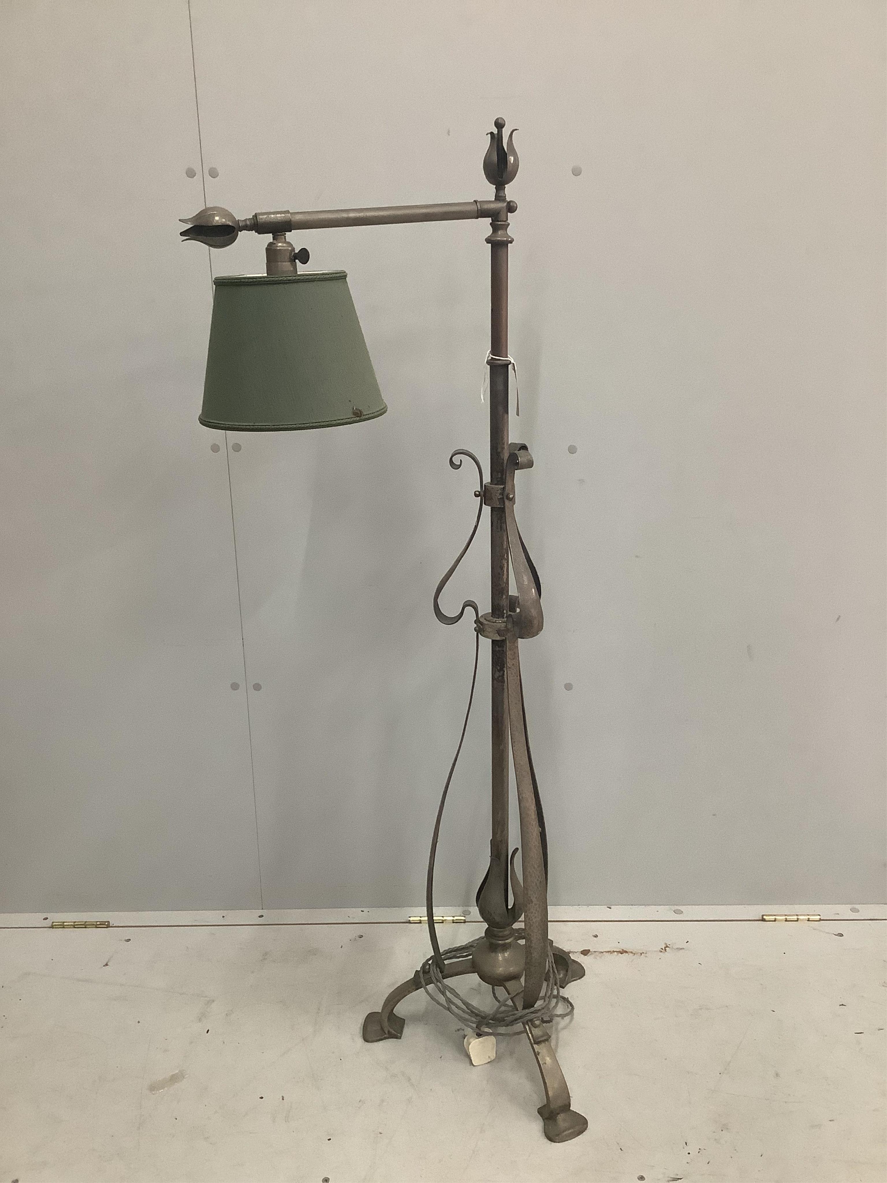 An Arts & Crafts wrought iron telescopic lamp standard. Condition - fair                                                                                                                                                    