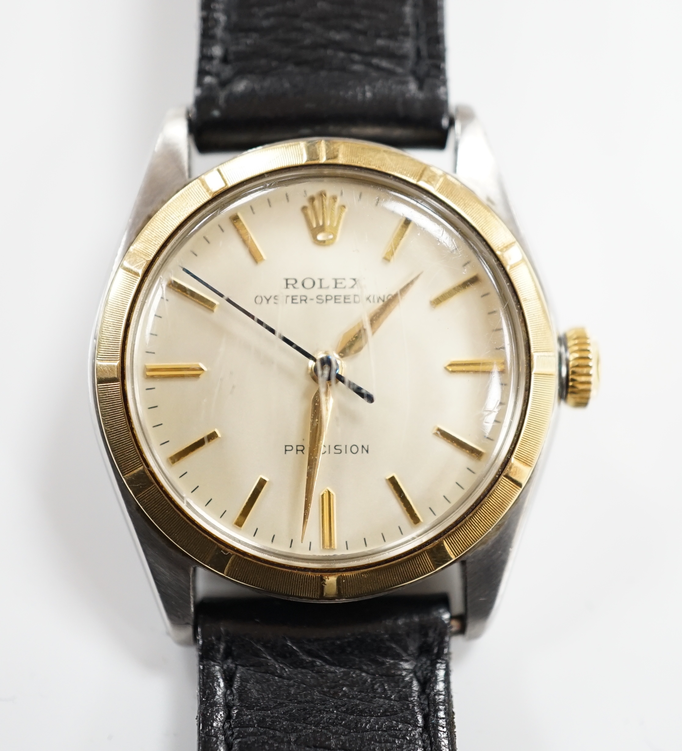 A gentleman's 1950's? steel and gold plated mid-size Rolex Oyster-Speed King Precision manual wind wrist watch, with baton numerals, model number 5021, serial number 654122, case diameter 32mm, on an associated leather s