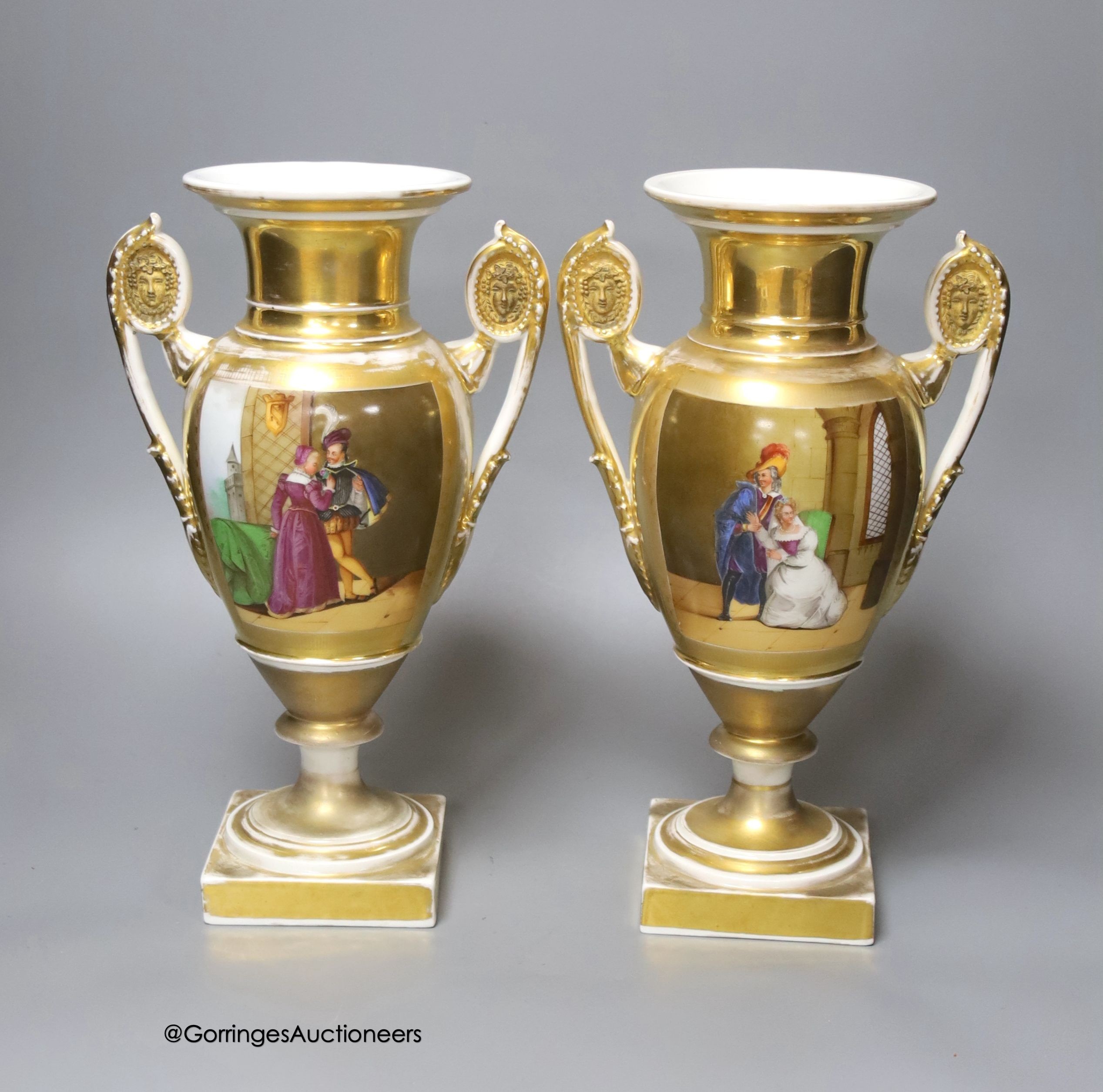 A pair of 19th century Paris vases decorated with medieval interiors, height 30cm                                                                                                                                           