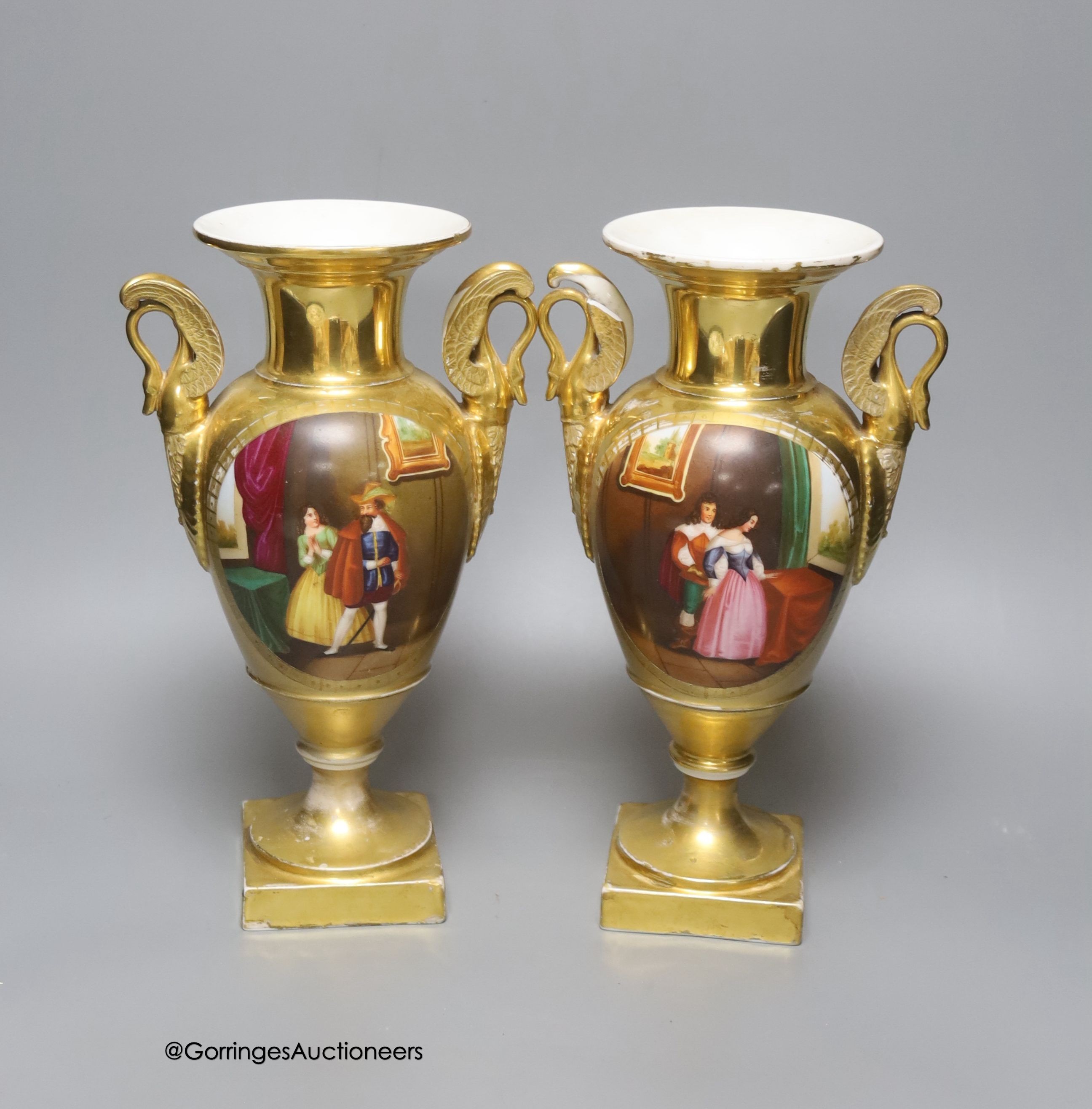 A pair of 19th century Paris porcelain vases, with winged swan handles, height 27cm                                                                                                                                         