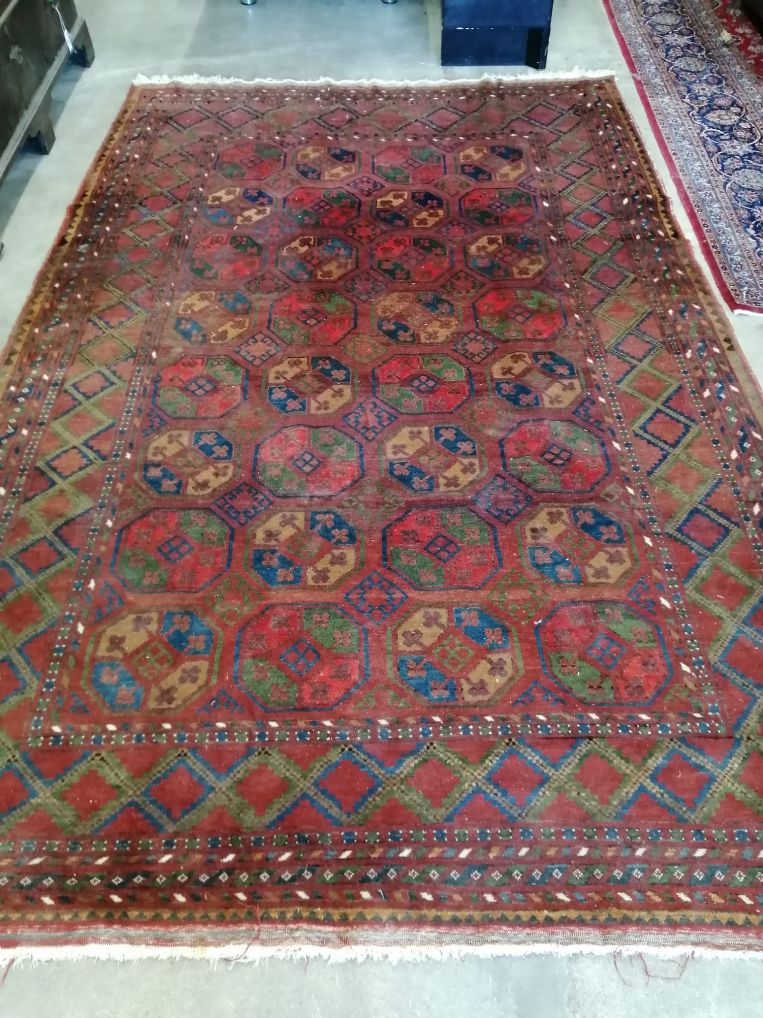 A Bokhara red ground carpet, 310 x 200cm                                                                                                                                                                                    