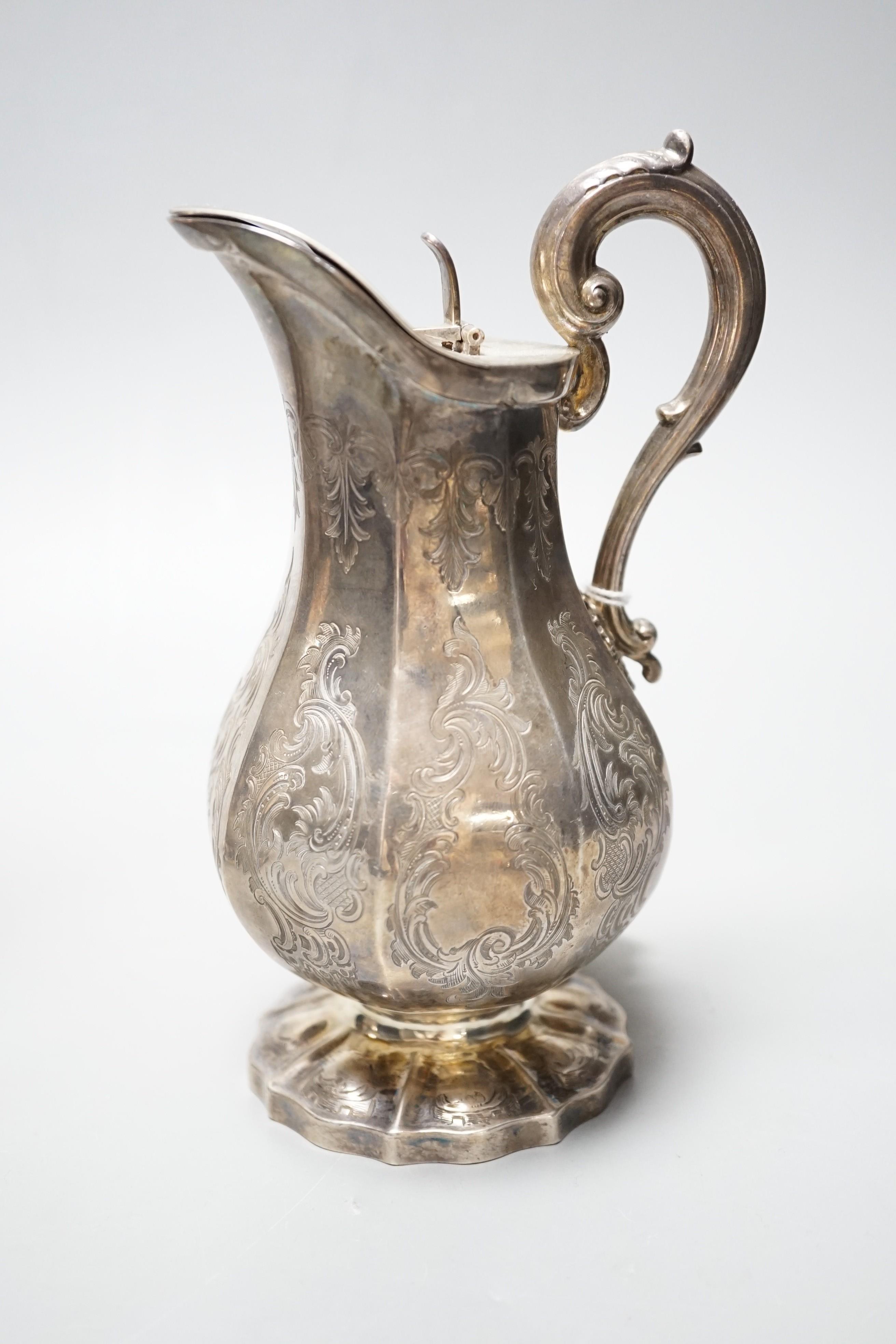 An early Victorian panelled pear shaped silver lidded cream jug, Charles & George Fox, London, 1845, 16.7cm, 9.5oz.                                                                                                         