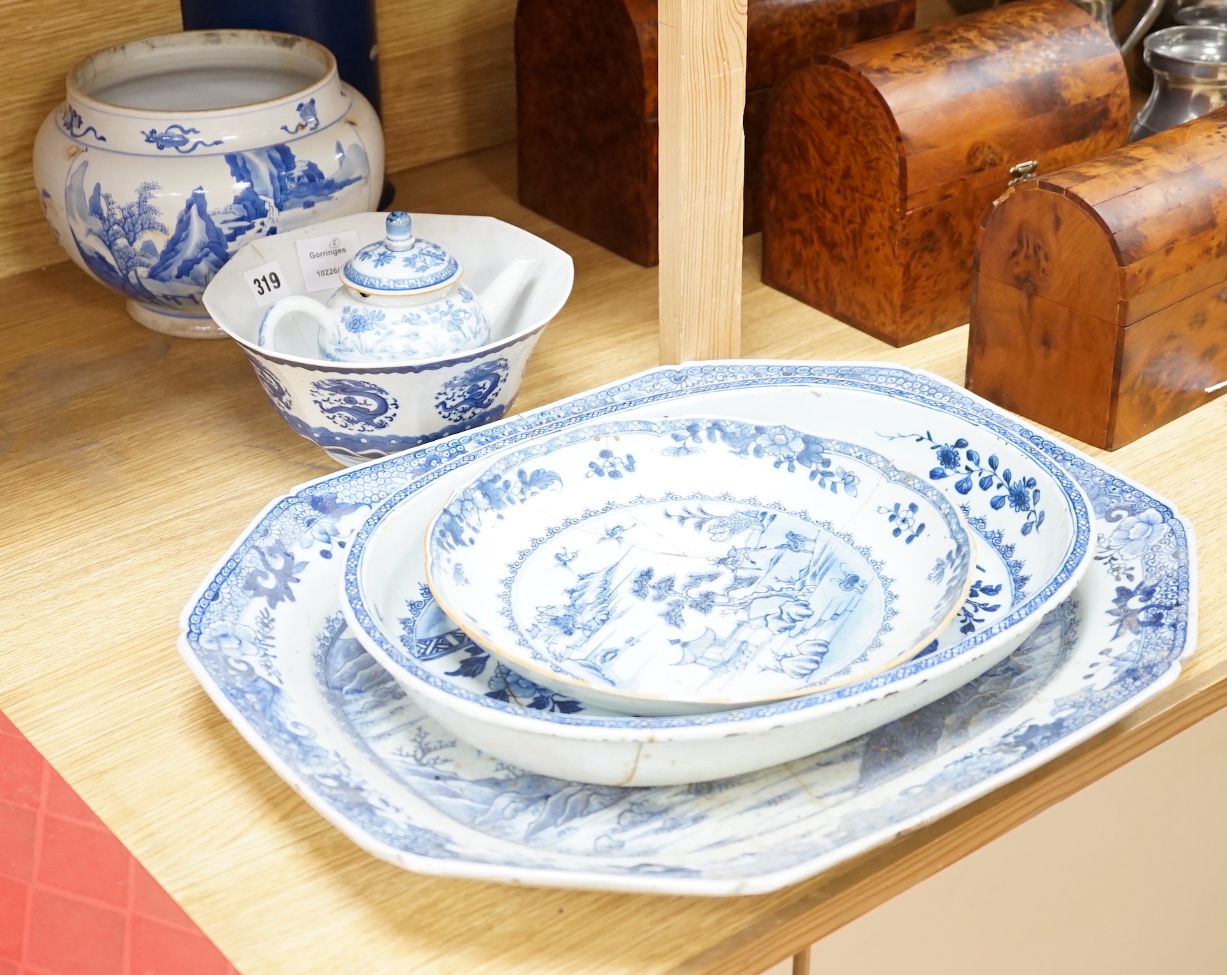 A group of 18th/19th century Chinese blue and white porcelain, including a Kangxi figure painted jar, a large meat dish, a hexagonal dragon bowl, a dish and a teapot with lid (6), meat dish 46cm wide                     