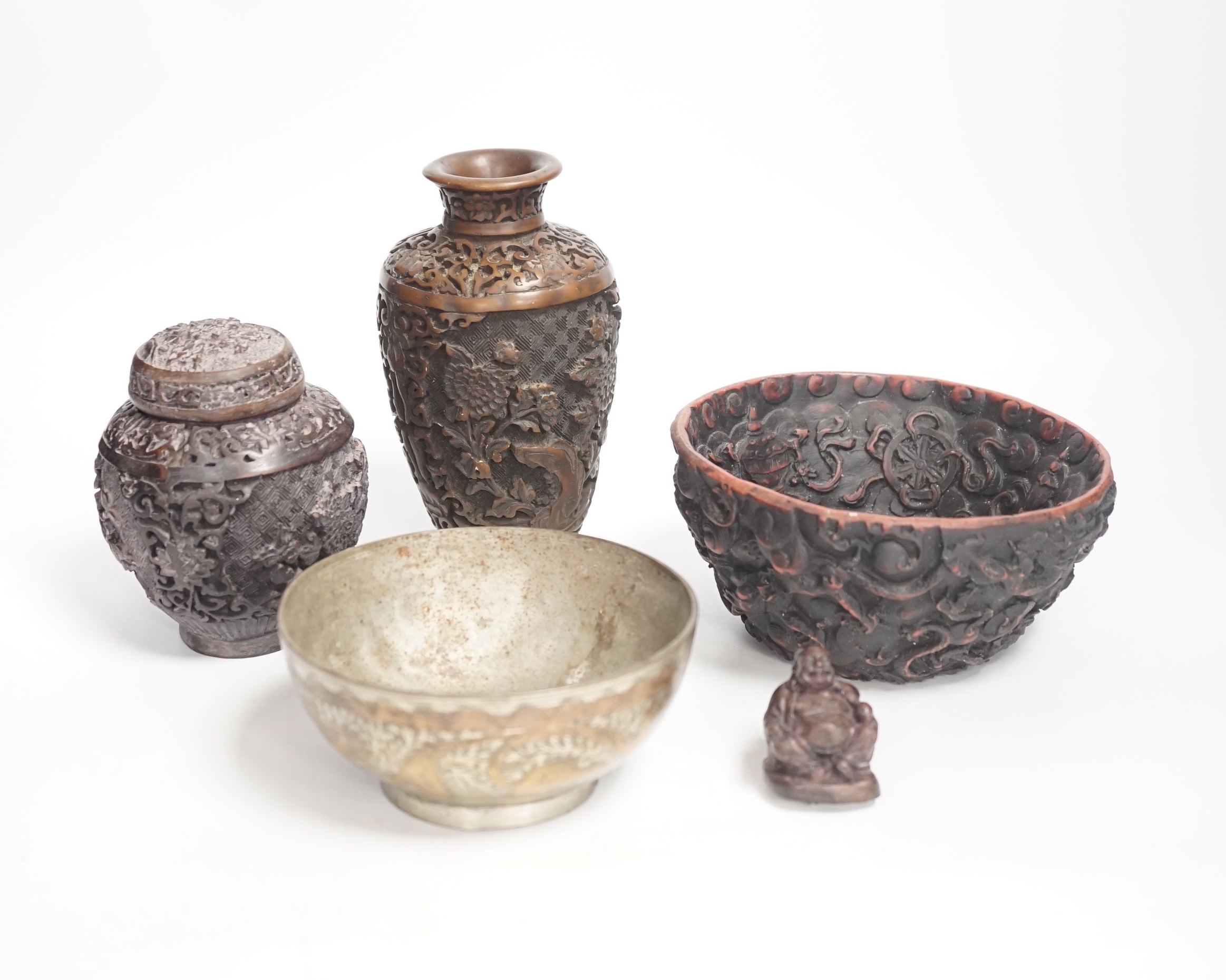 An Indian bronze bowl, two Chinese jars, 'dragon' bowl and a seated figure of Buddha, 15cm high                                                                                                                             