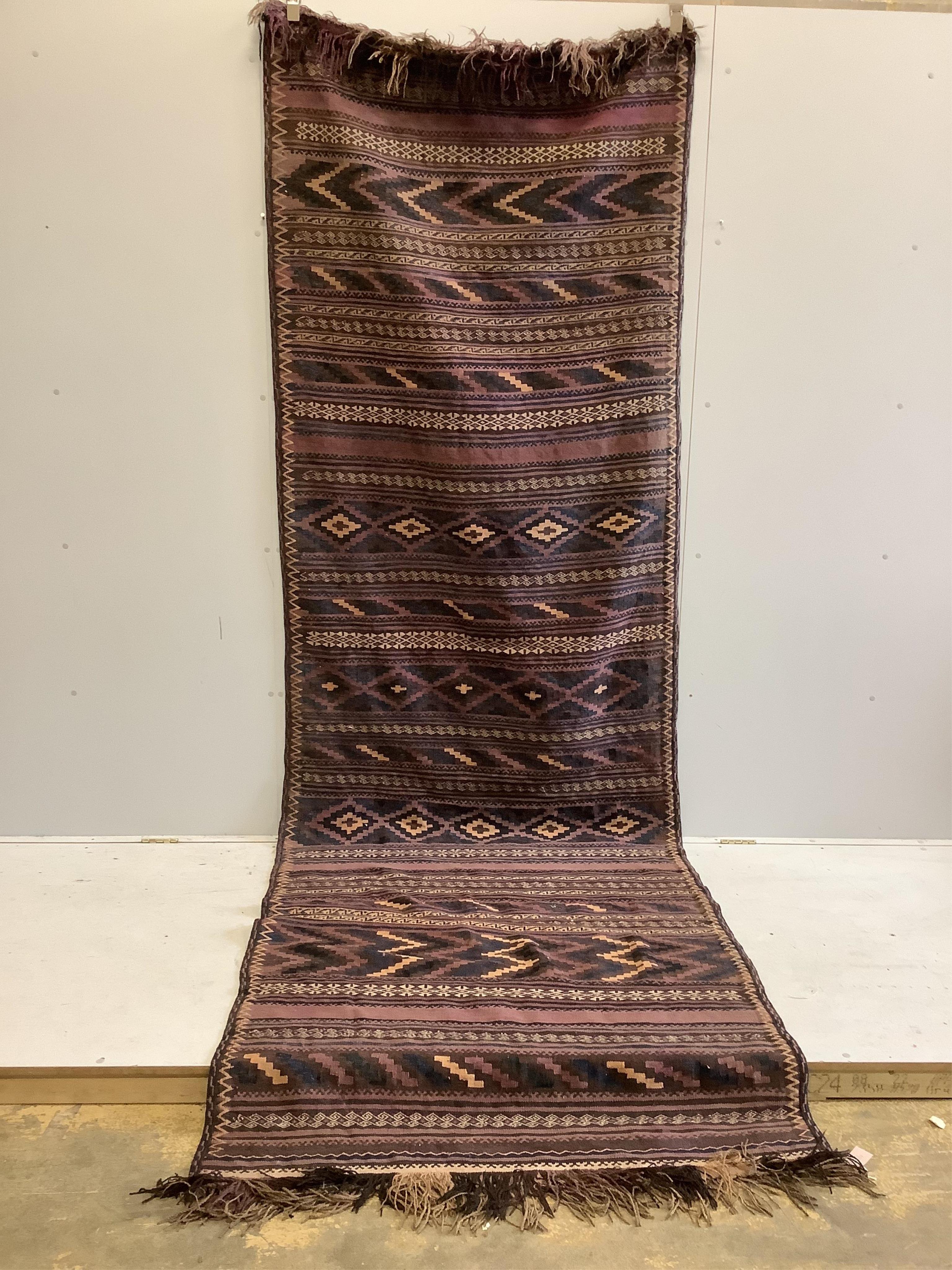 A Kilim flat weave runner, 370 x 120cm. Condition - fair                                                                                                                                                                    