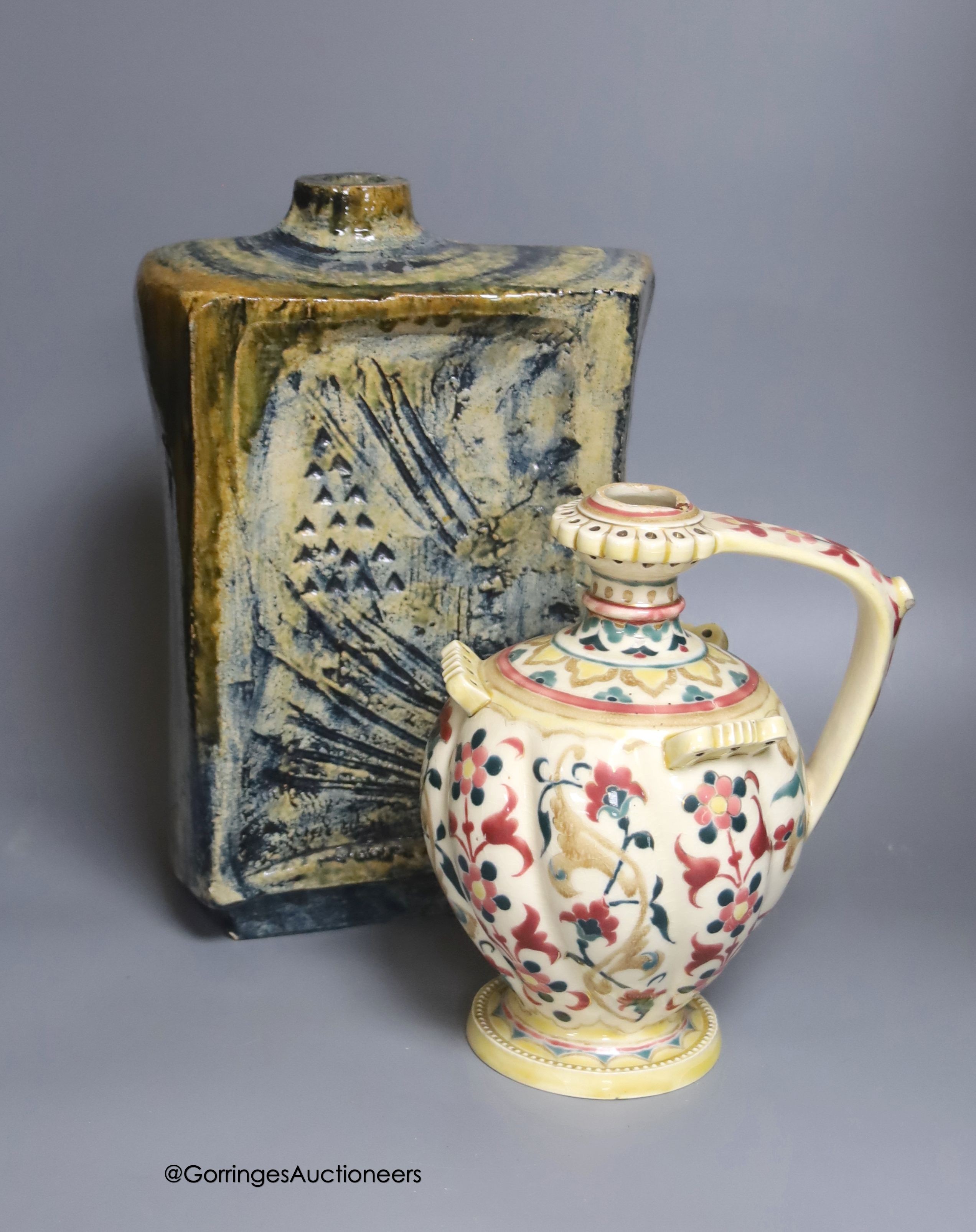 A Zsolnay Pecs polychrome ewer and a Zsolnay studio vase, height 34cm                                                                                                                                                       