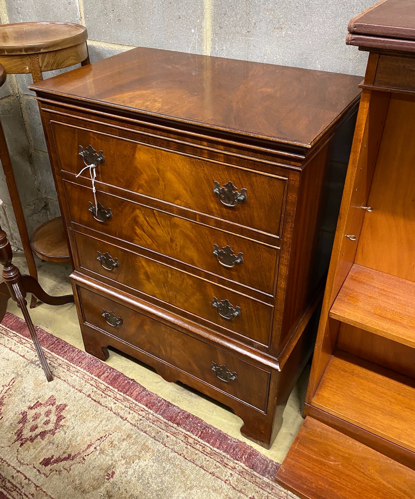 A reproduction mahogany four drawer chest, width 69cm, depth 43cm, height 92cm                                                                                                                                              