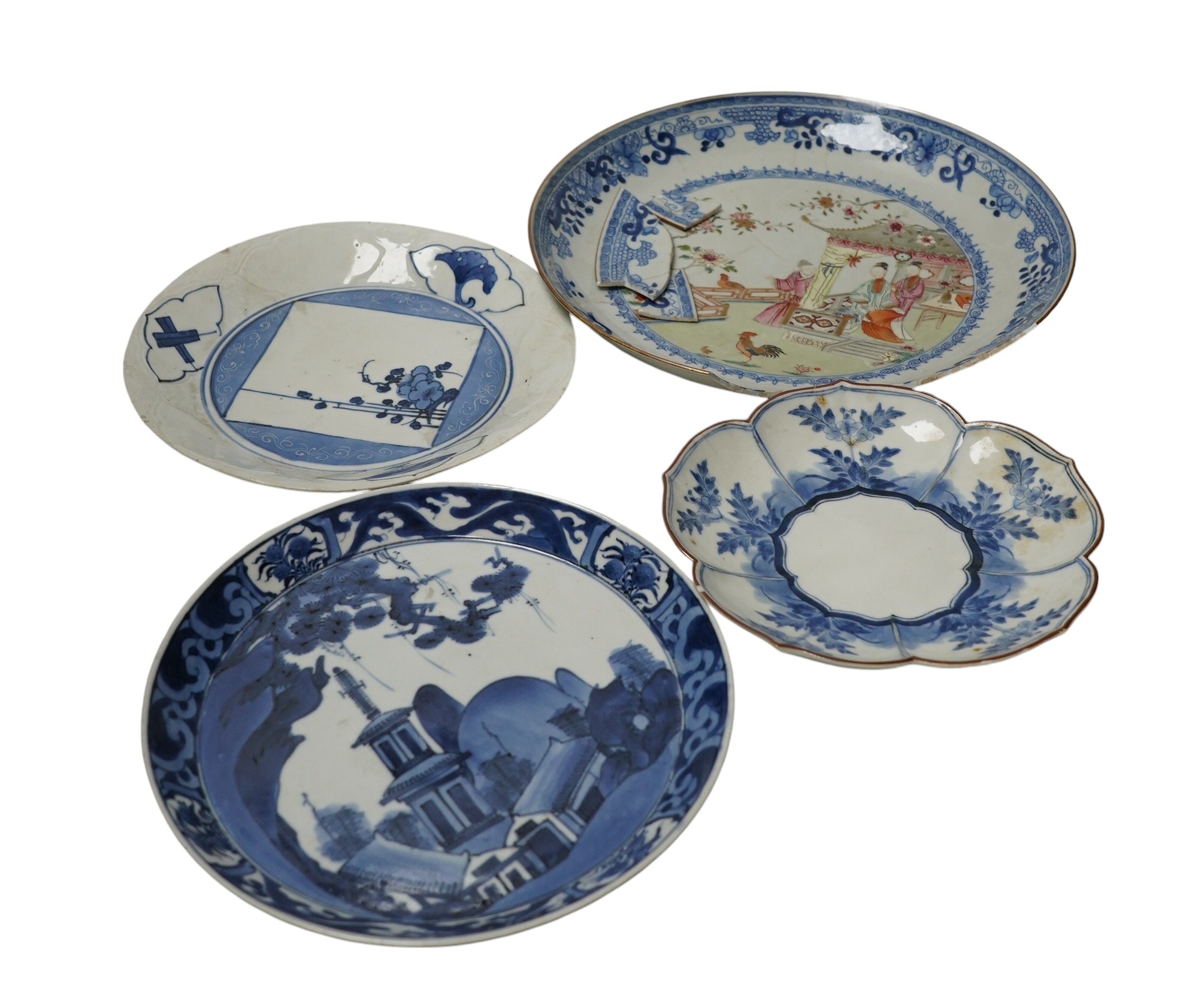 Three Japanese Kakiemon style blue and white dishes and an 18th century Chinese famille rose dish. Condition - varies                                                                                                       