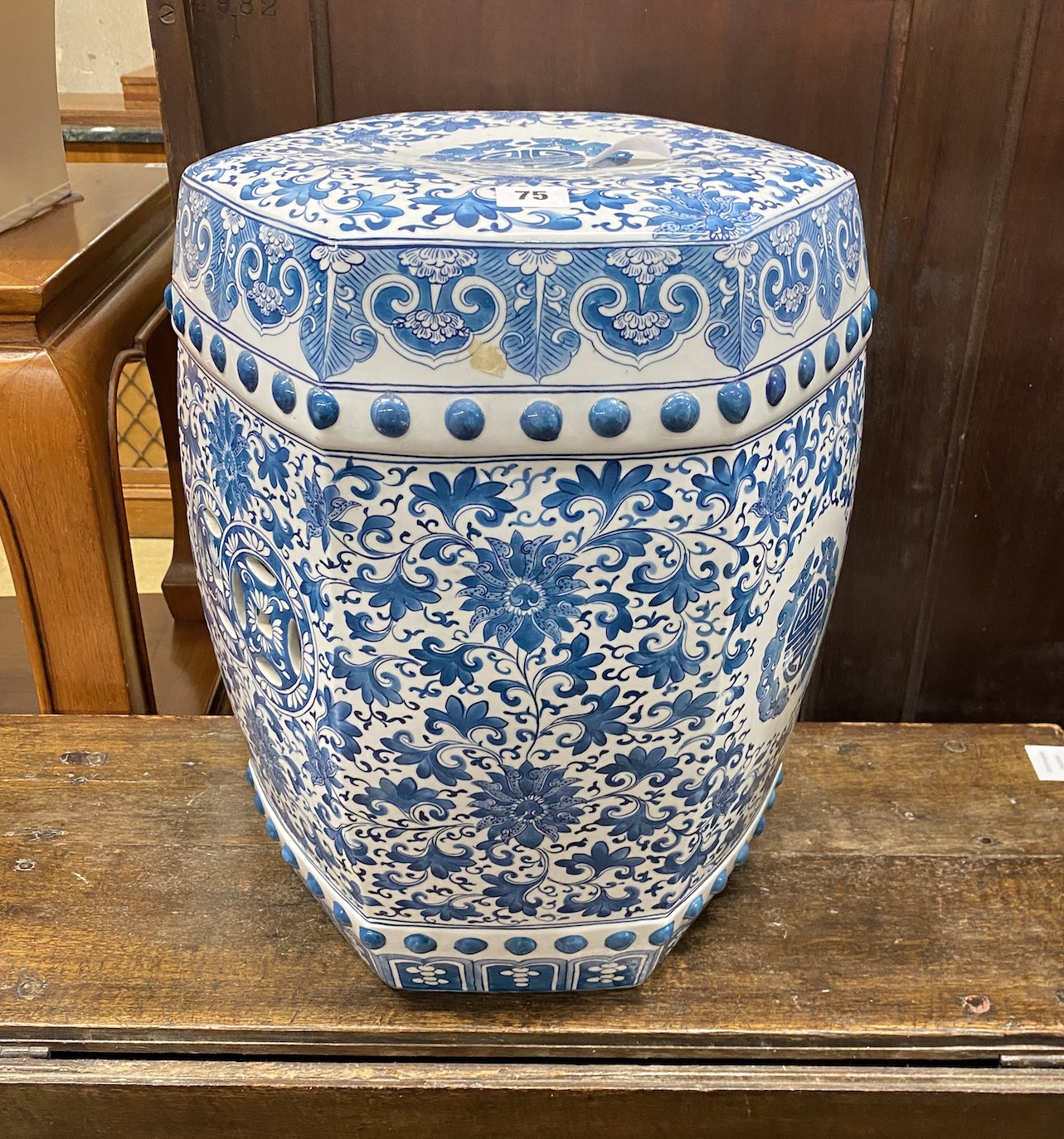 A Chinese hexagonal blue and white porcelain garden seat, height 46cm                                                                                                                                                       