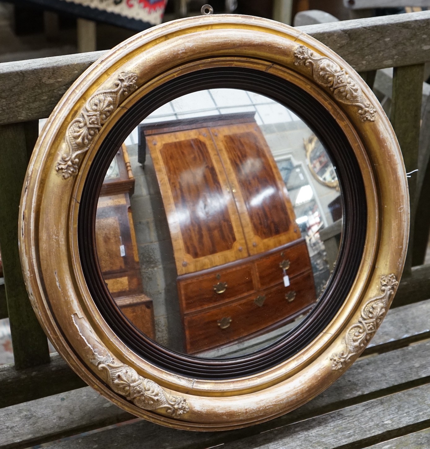 A Regency circular giltwood and gesso convex wall mirror, diameter 54cm                                                                                                                                                     