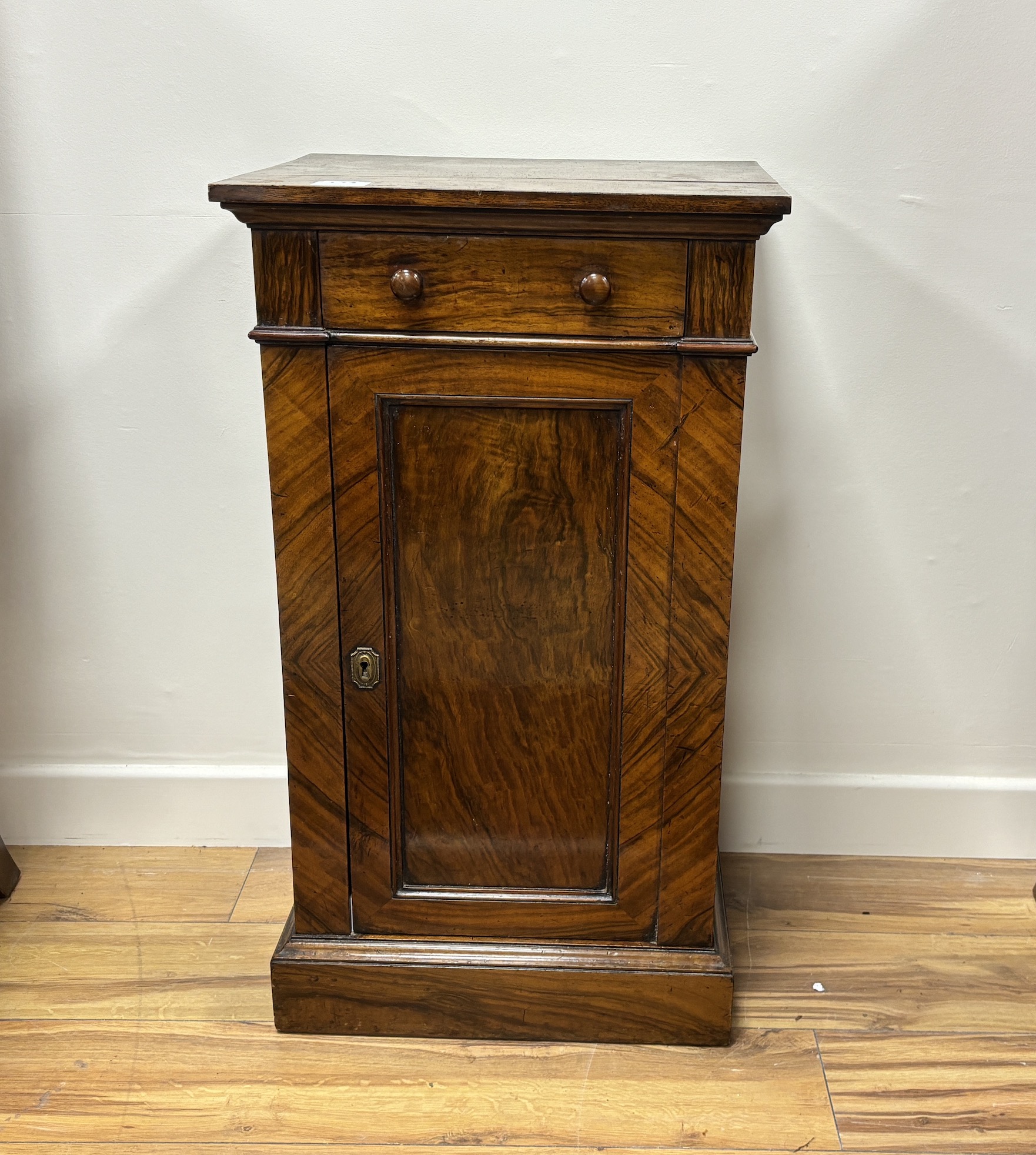A Victorian walnut bedside cabinet, width 43cm, depth 35cm, height 76cm                                                                                                                                                     