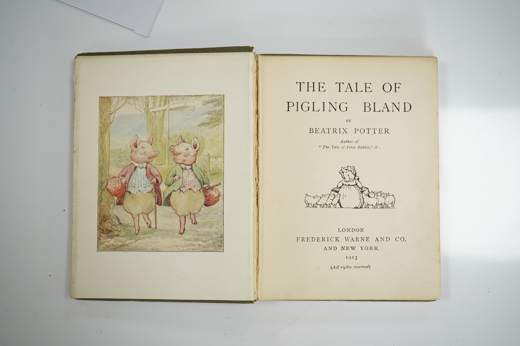 Potter, Beatrix - The Tale of Pigling Bland. First Edition. title illus., frontis., 14 coloured and other text illus., pictorial coloured e/ps.; light green paper boards lettered in brown, with mounted coloured illus. on