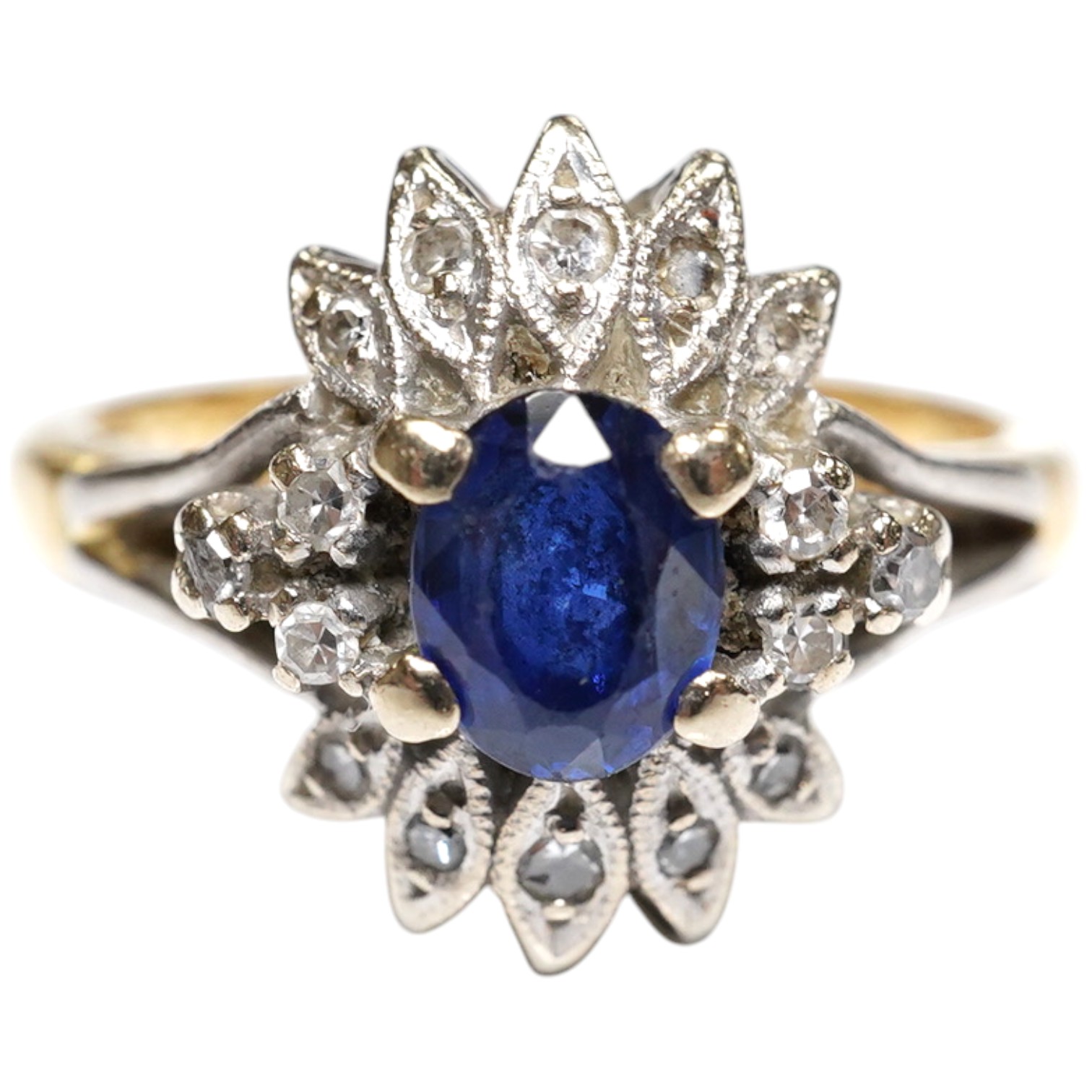 A modern 18ct gold, sapphire and diamond cluster set ring, size M/N, gross weight 4.6 grams. Condition - poor to fair                                                                                                       