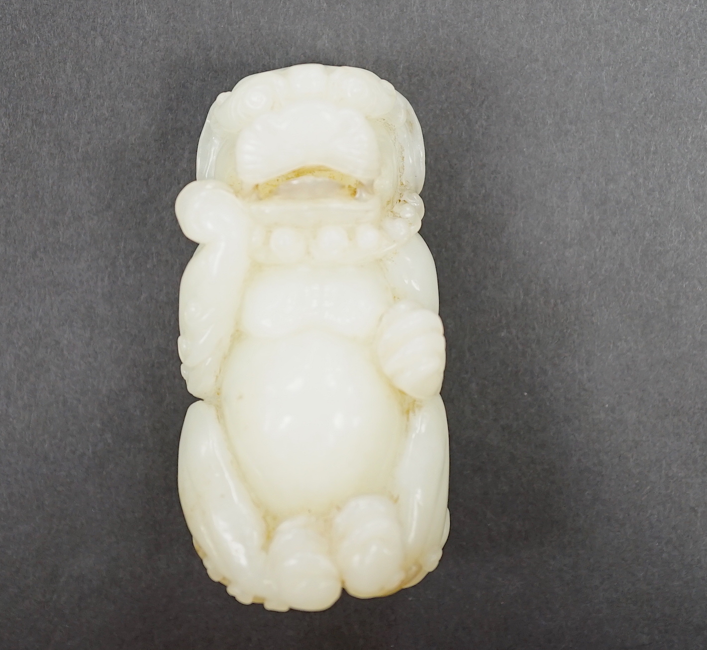 A Chinese white jade lion dog, 7cm                                                                                                                                                                                          