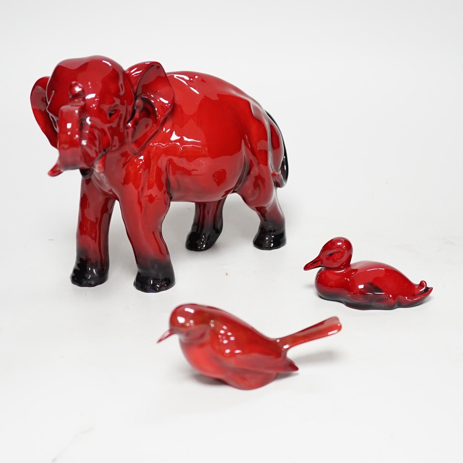 Three Royal Doulton Flambe animals                                                                                                                                                                                          