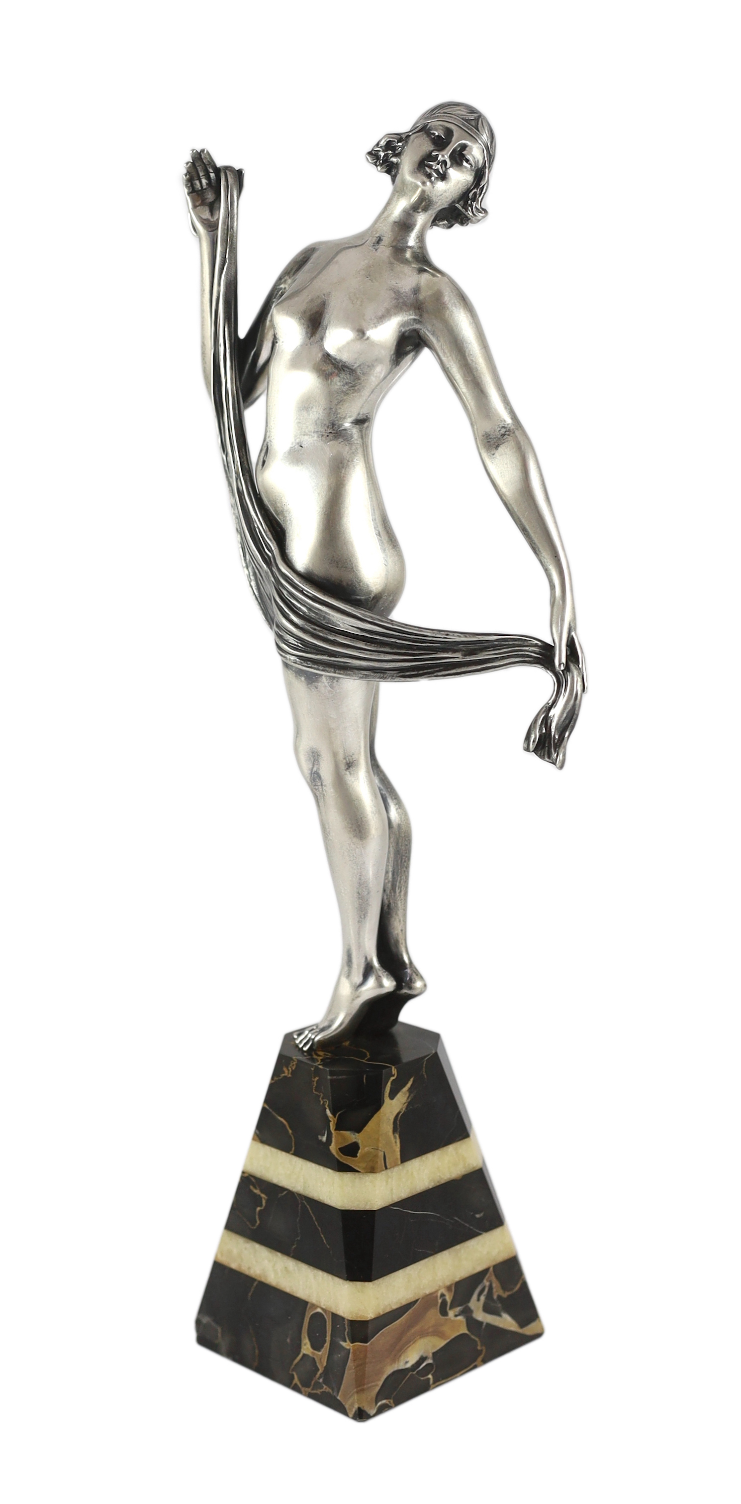 Henri Fugère (1872-1944). An Art Deco silvered bronze figure of a nude dancer 13cm wide, 39cm high                                                                                                                          