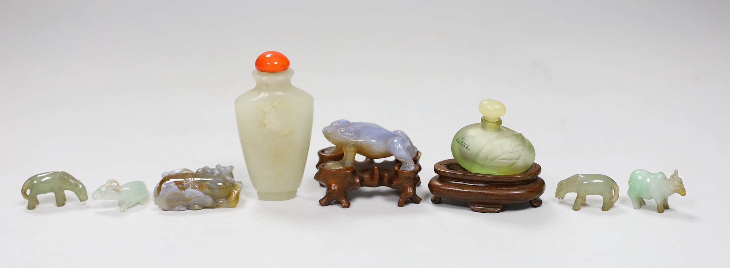 A Chinese jade snuff bottle, together with six animal hardstone figures, and a small perfume bottle                                                                                                                         