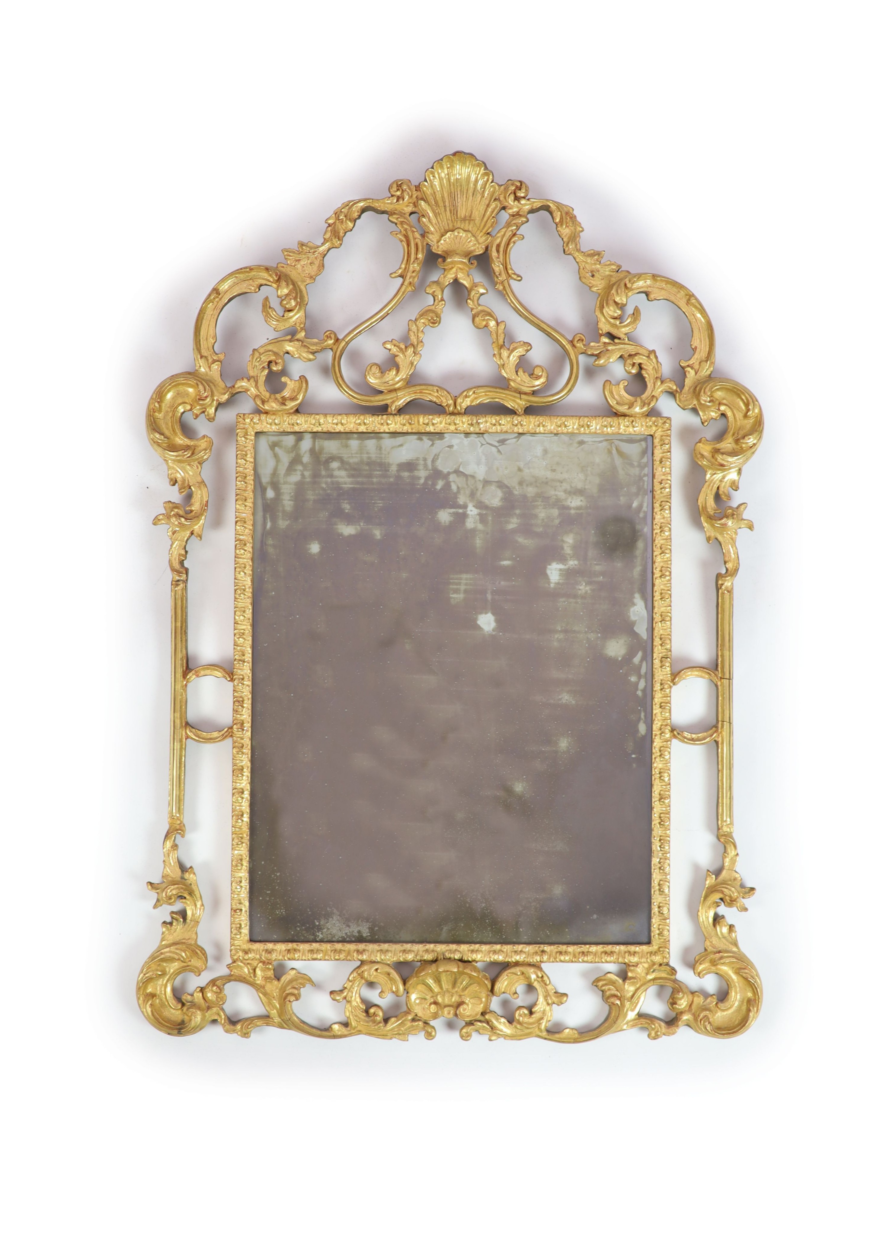 A George III style carved giltwood wall mirror, W.76cm H.110cm                                                                                                                                                              