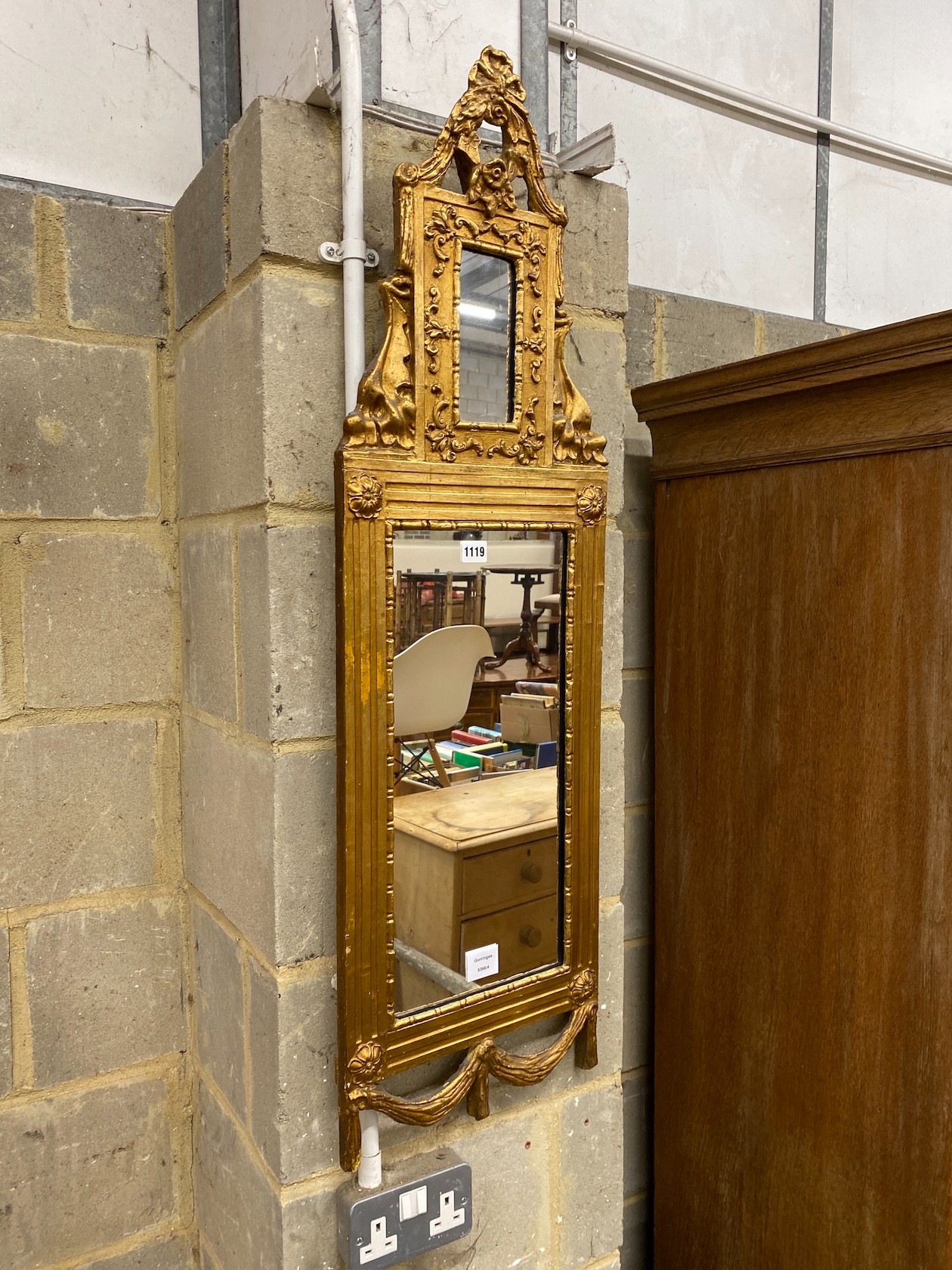 A 19th century Continental gilt gesso wall mirror, width 33cm, height 110cm                                                                                                                                                 