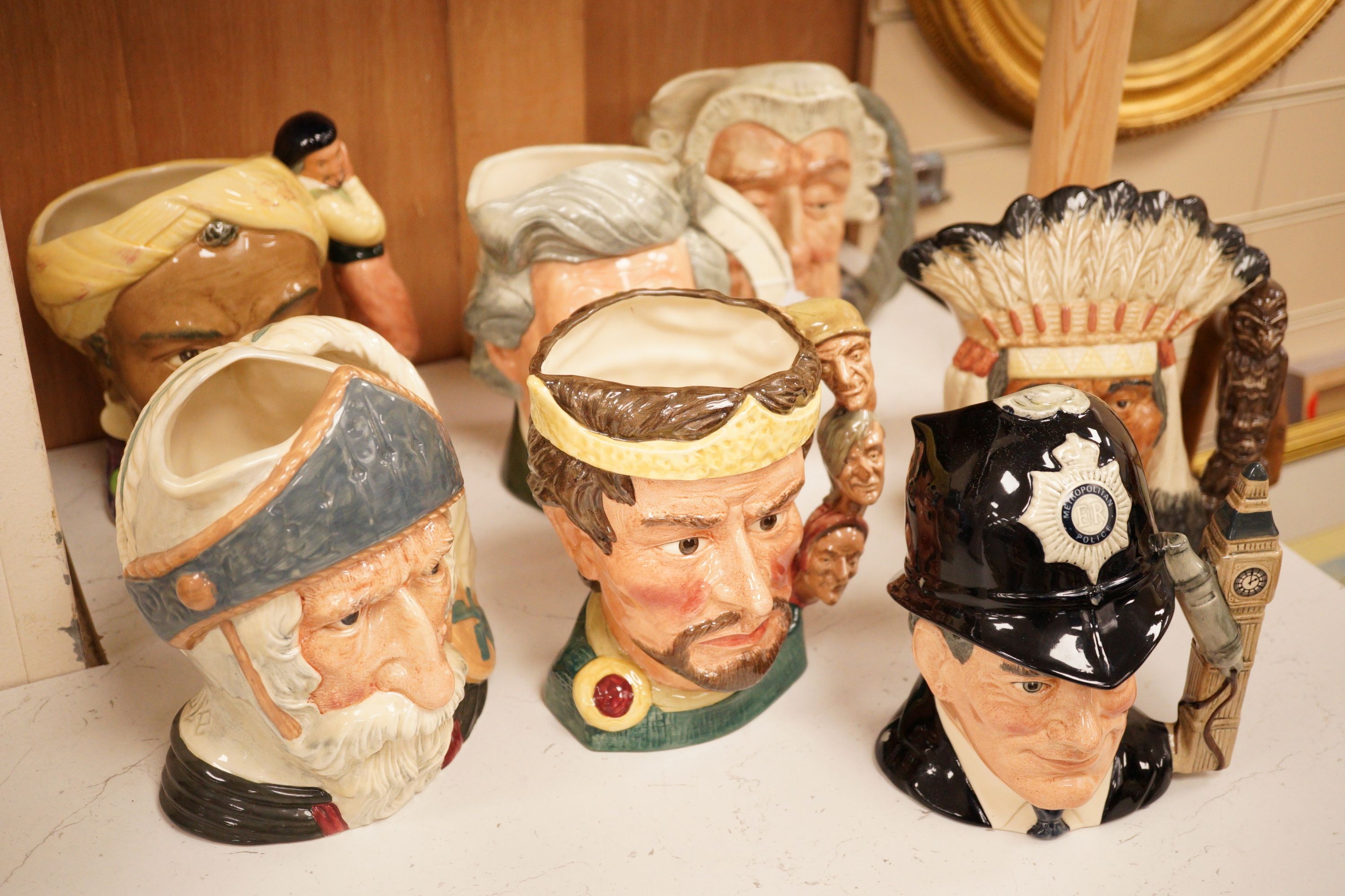 A group of seven various Doulton large character jugs                                                                                                                                                                       