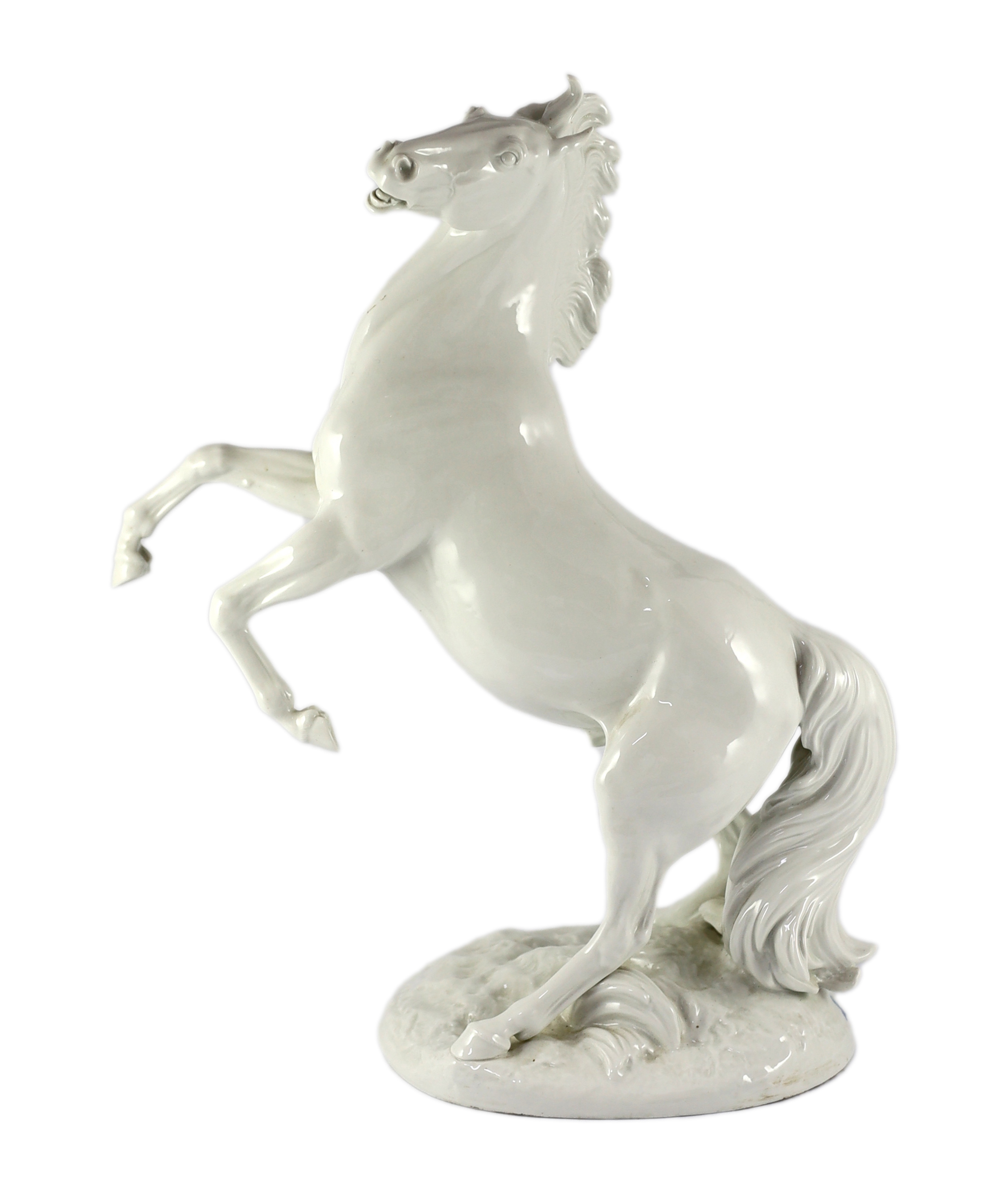 A large Meissen figure of a rearing stallion modelled by Eric Oehme, c.1949                                                                                                                                                 