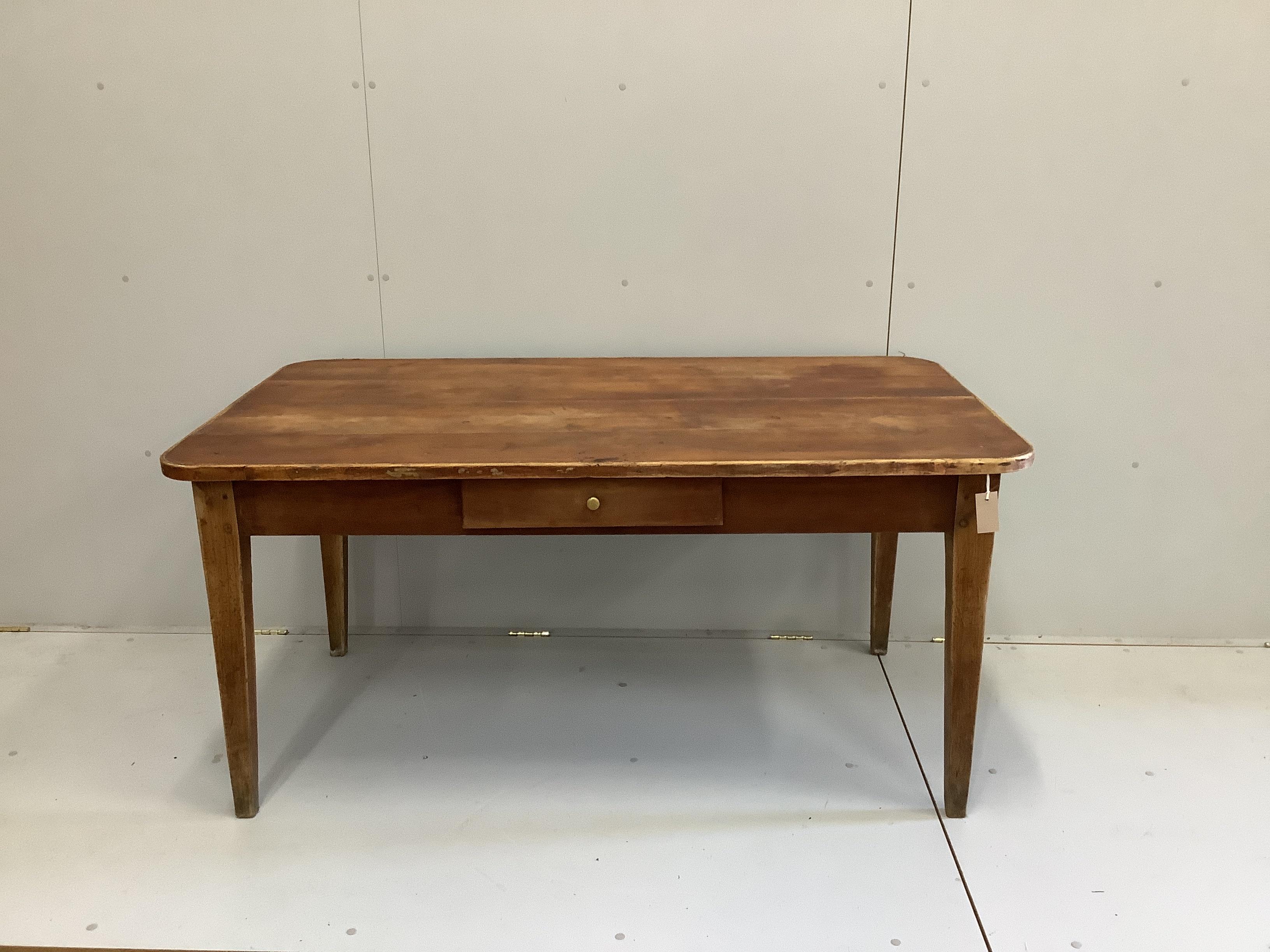 A 19th century French oak and fruitwood kitchen table, fitted drawer, length 149cm, width 83cm, height 72cm                                                                                                                 