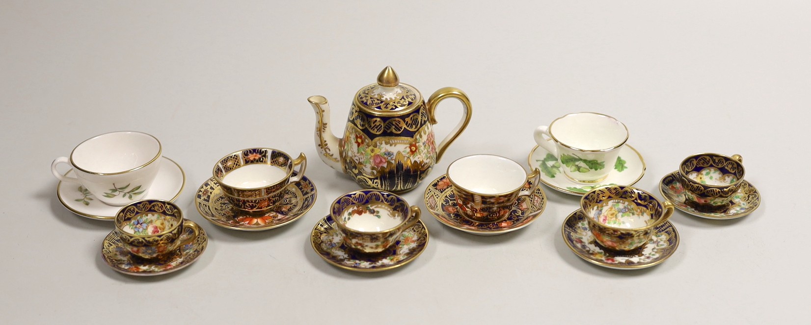 Miniature bone china teaware including Spode and Royal Crown Derby                                                                                                                                                          