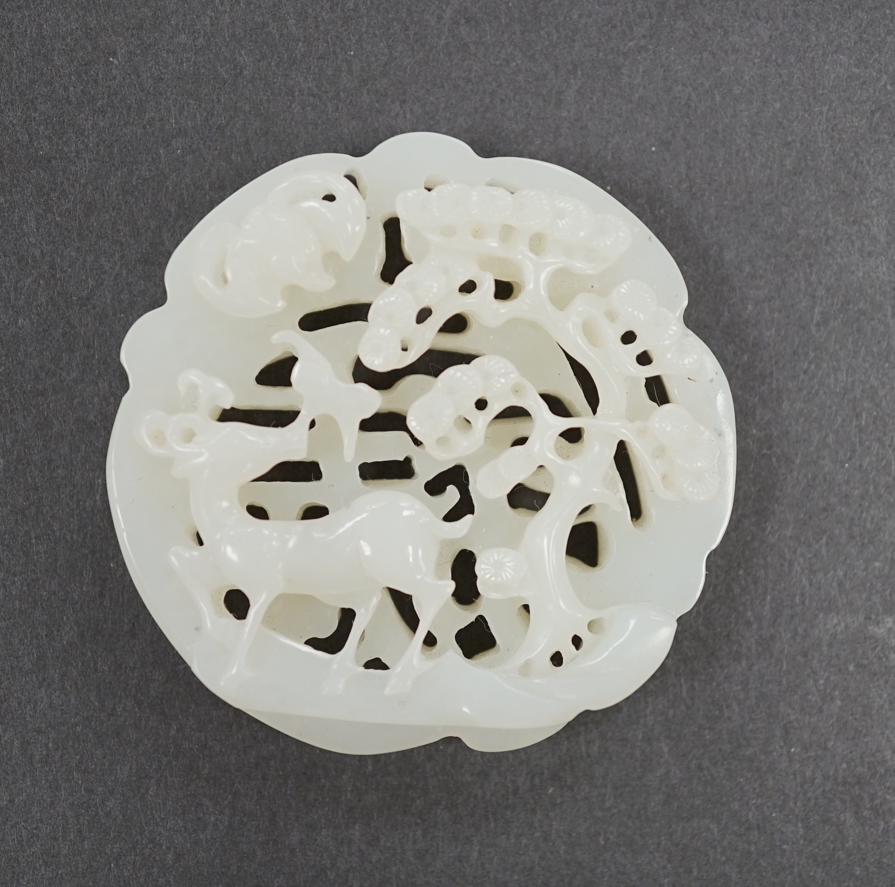 A Chinese white jade ‘deer’ pendant, 5.5cm                                                                                                                                                                                  