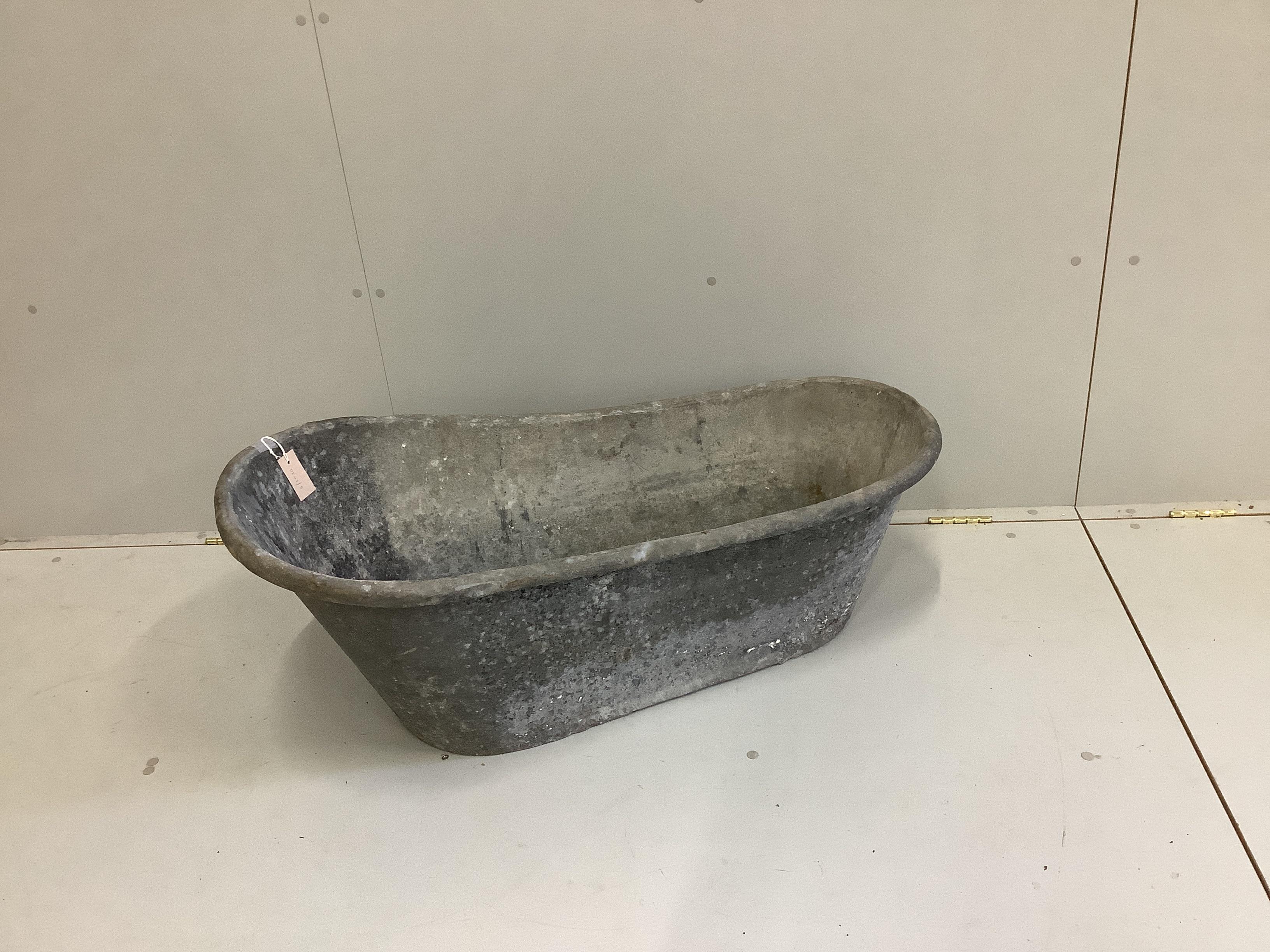 A vintage French galvanised child's bath, length 103cm, height 42cm                                                                                                                                                         