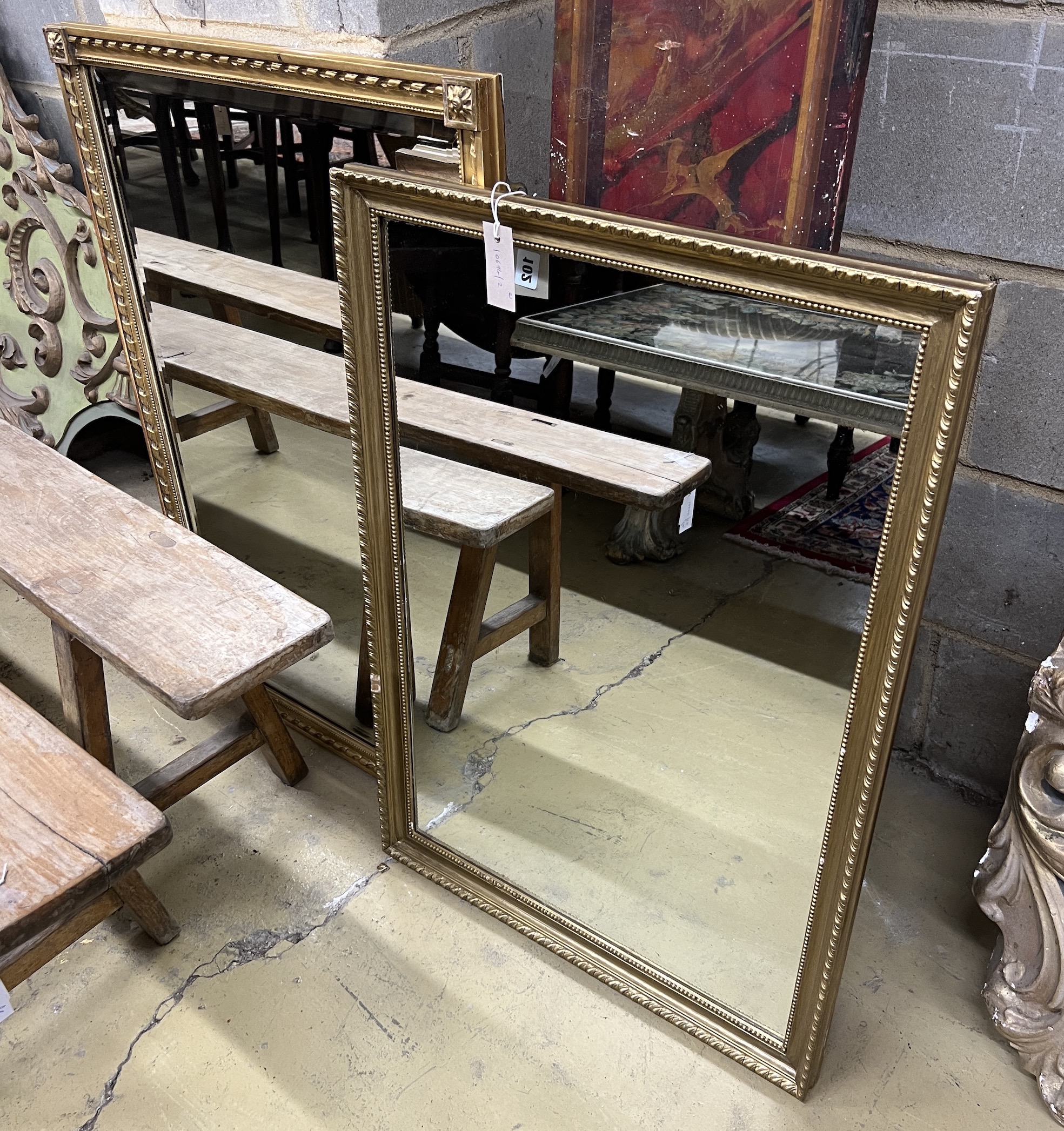 Two rectangular giltwood and composition wall mirrors, larger width 65cm, height 91cm                                                                                                                                       