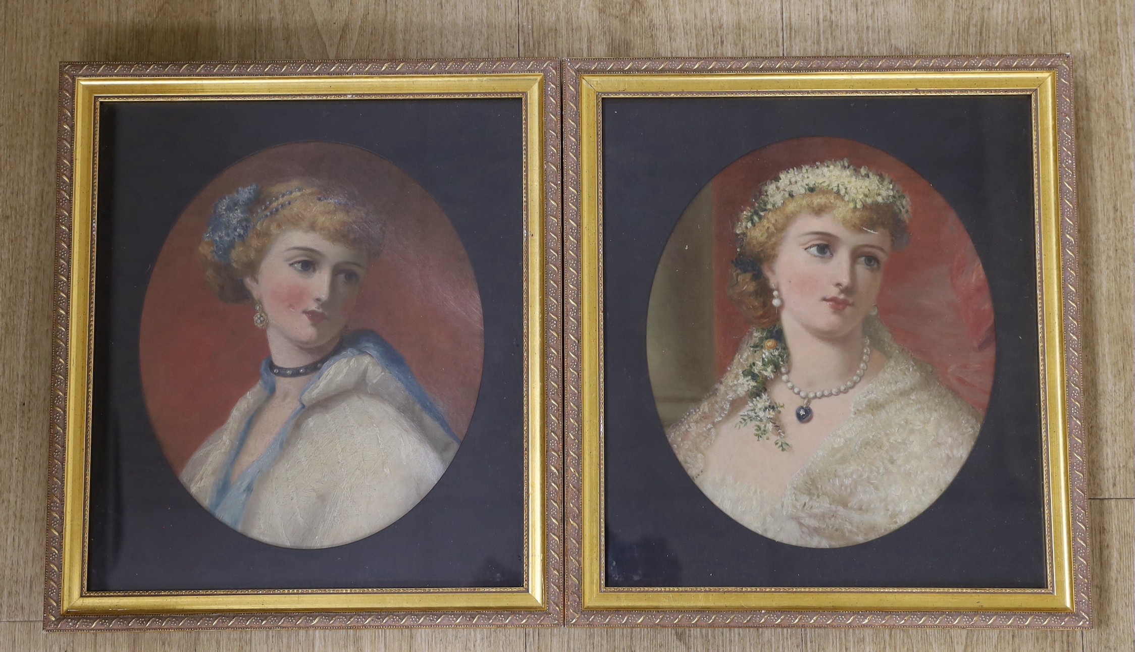 English School c.1900, pair of oils on canvas, Portraits of a bride, ovals, 27 x 23cm                                                                                                                                       