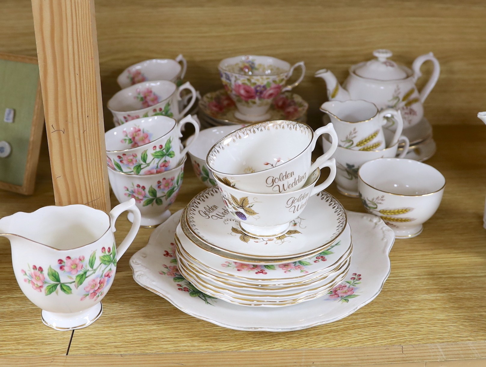 Two Royal Albert part tea services 'Evesham' and ‘Golden Bramble’                                                                                                                                                           