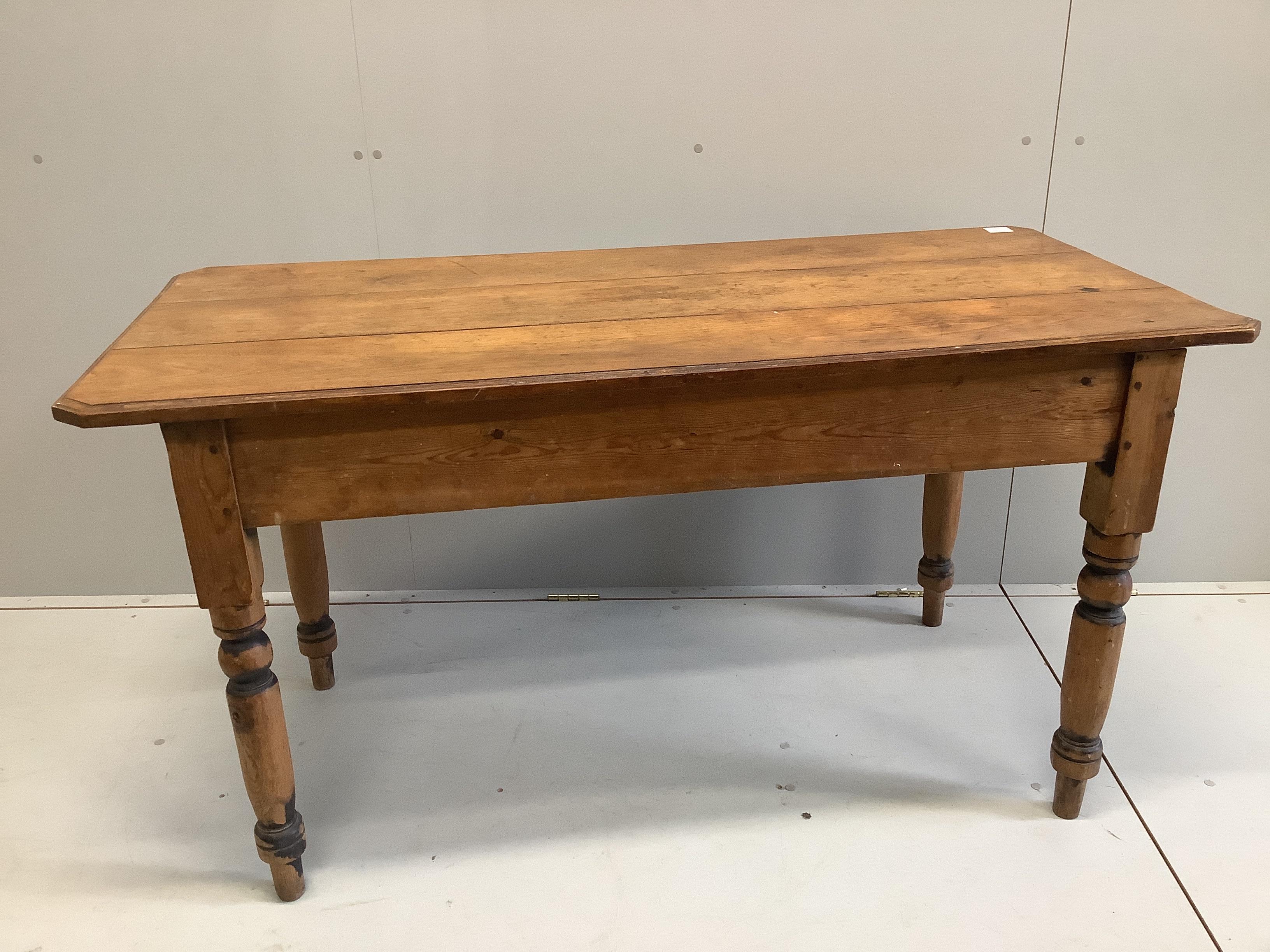 A Victorian pine and mahogany centre table, width 143cm, depth 67cm, height 76cm                                                                                                                                            