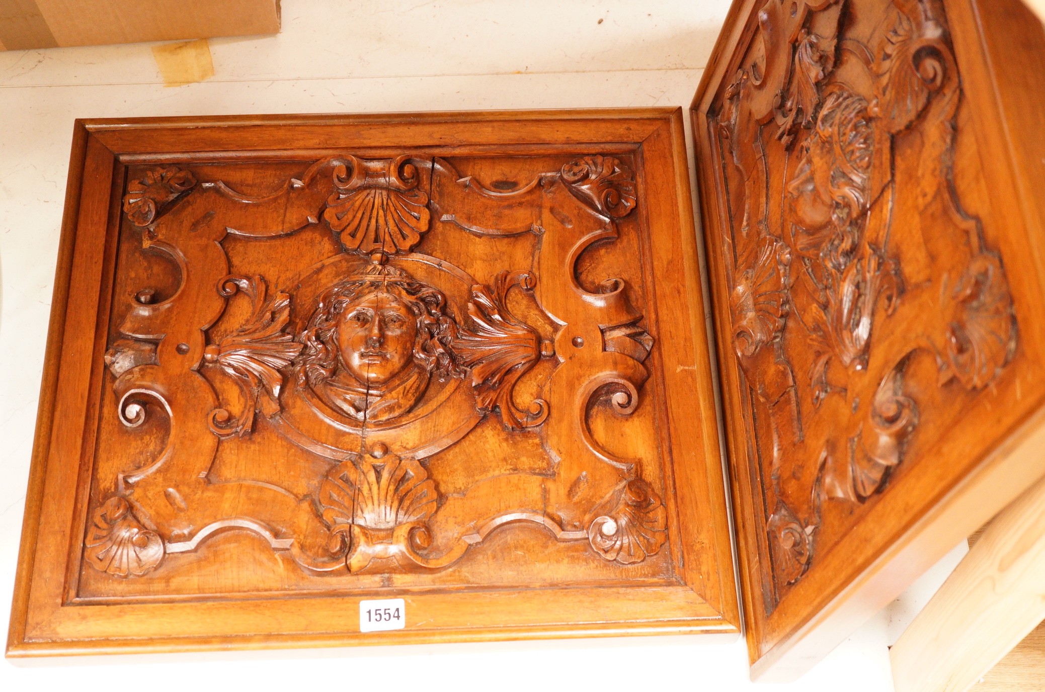 A pair of Mannerist style carved walnut panels, 47x52cm                                                                                                                                                                     