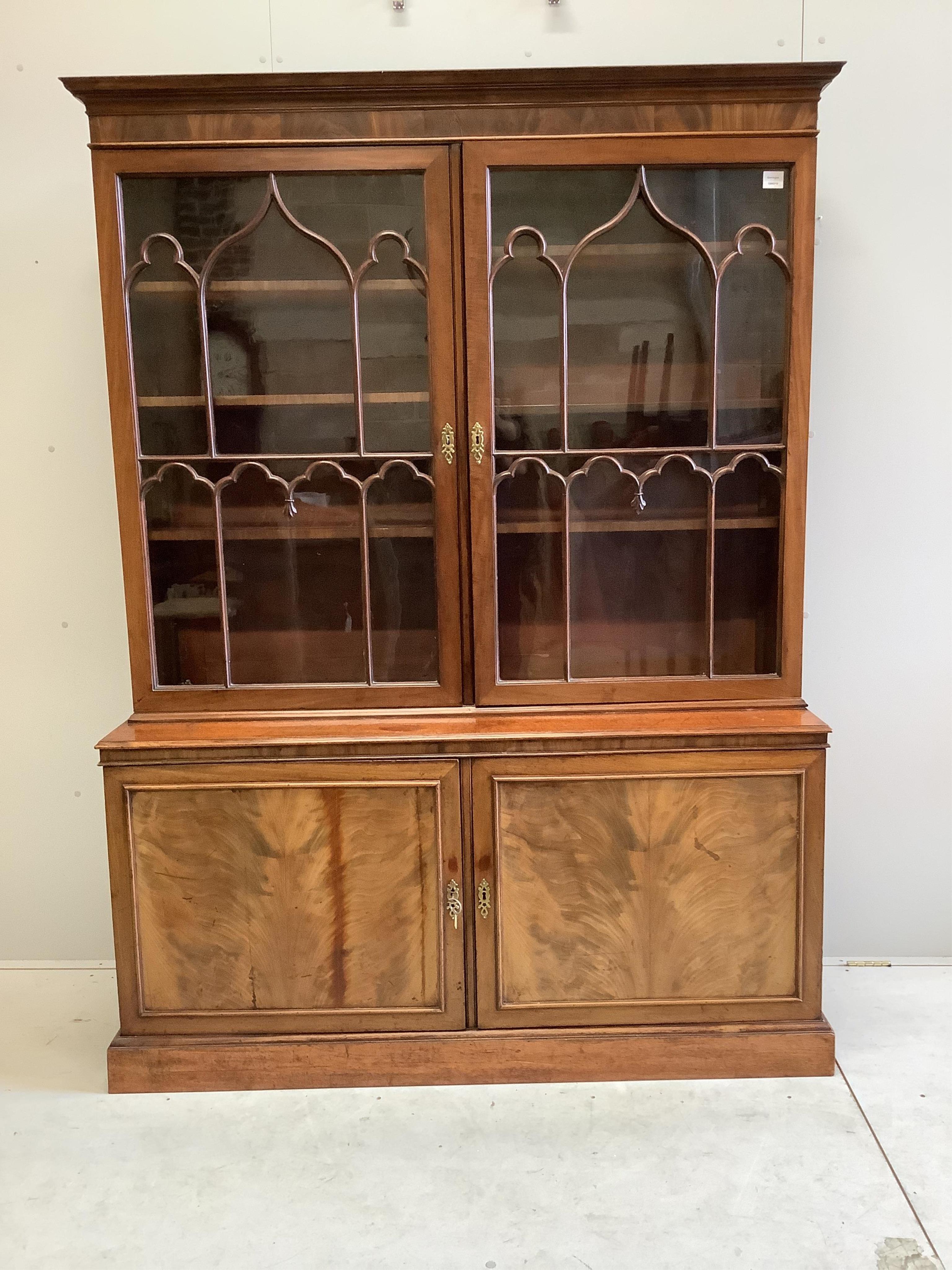 A George III mahogany bookcase, width 152cm, depth 47cm, height 203cm. Condition - fair to good                                                                                                                             