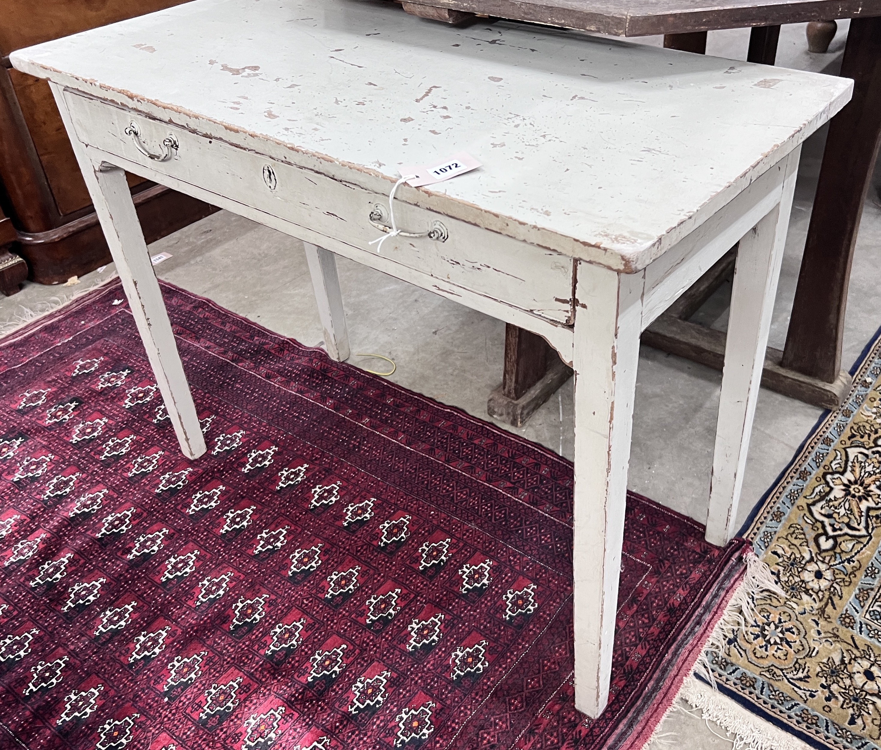 A 19th century painted single drawer side table, width 91cm, depth 43cm, height 69cm                                                                                                                                        