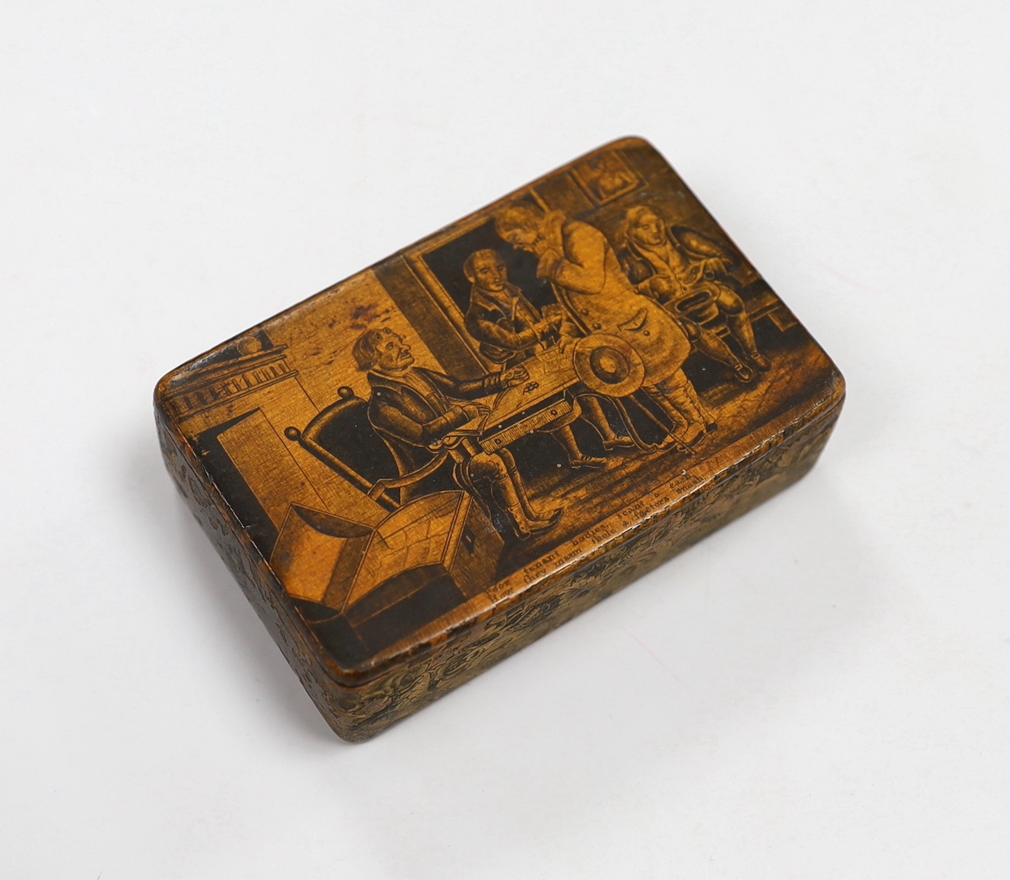 A 19th century mauchline ware penwork snuff box, depicting a rent collector in an interior and inscribed verse, 8cm wide                                                                                                    