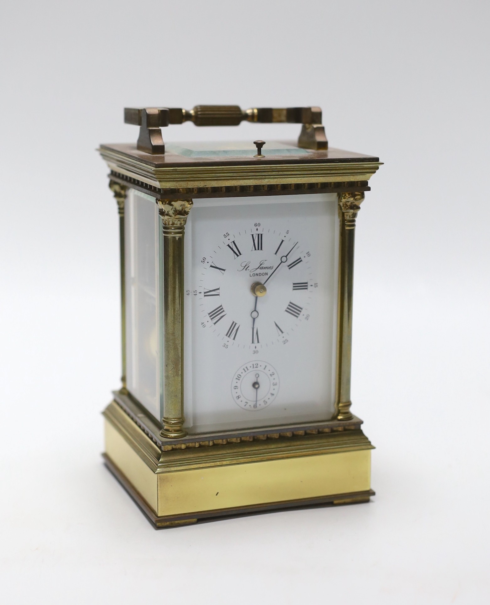 A large brass cased carriage clock retailed by St. James, 17cm                                                                                                                                                              