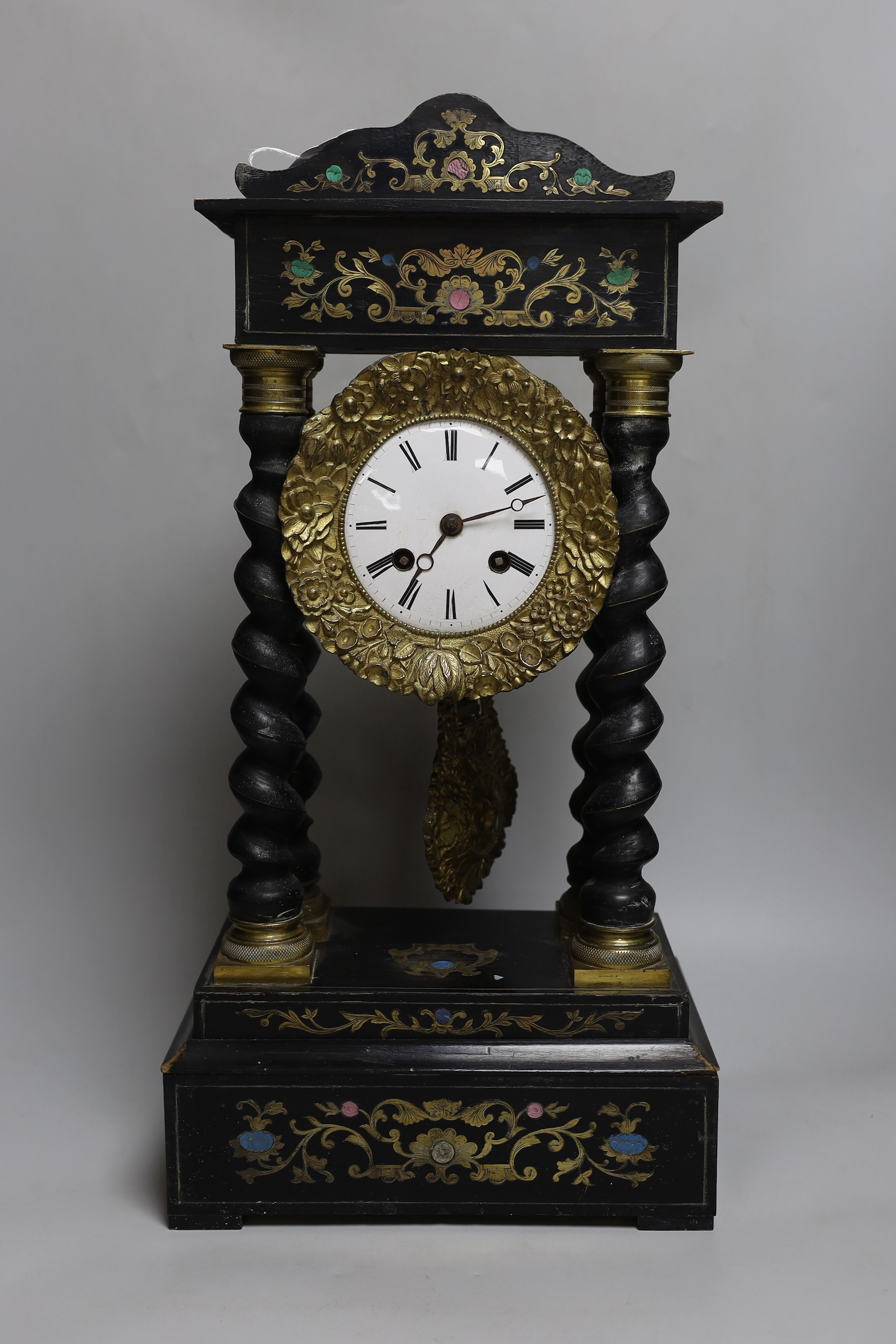 A French Napoleon III ebonised and brass inlaid portico clock, 26.5cm wide, 53cm high                                                                                                                                       