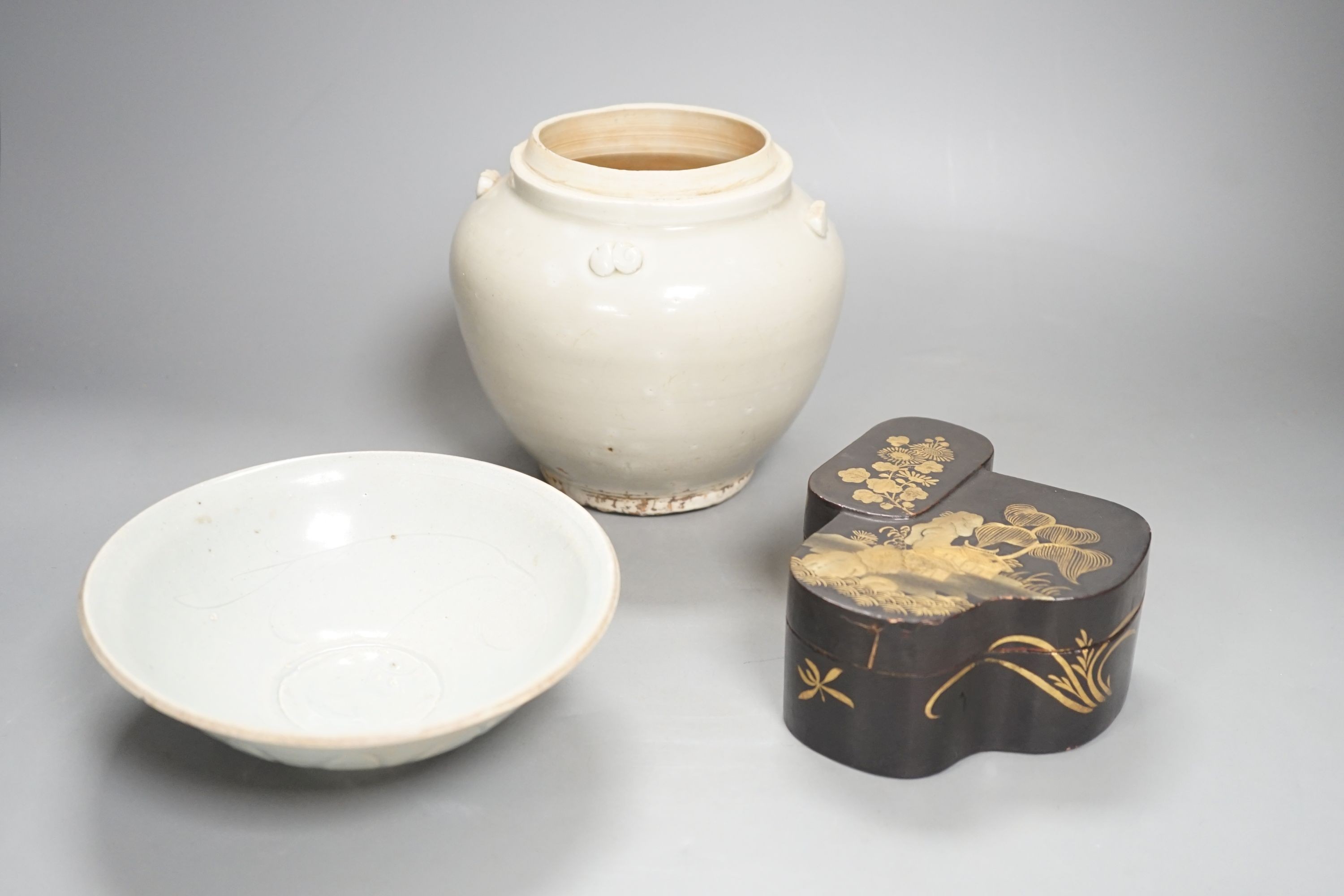 A Chinese Qingbai type bowl, a Ding type jar and a Japanese lacquer box, tallest 15cm                                                                                                                                       