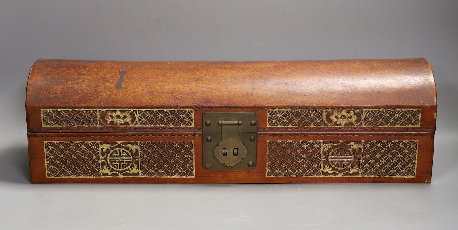 A Chinese leather covered scroll case, 52 cm wide                                                                                                                                                                           