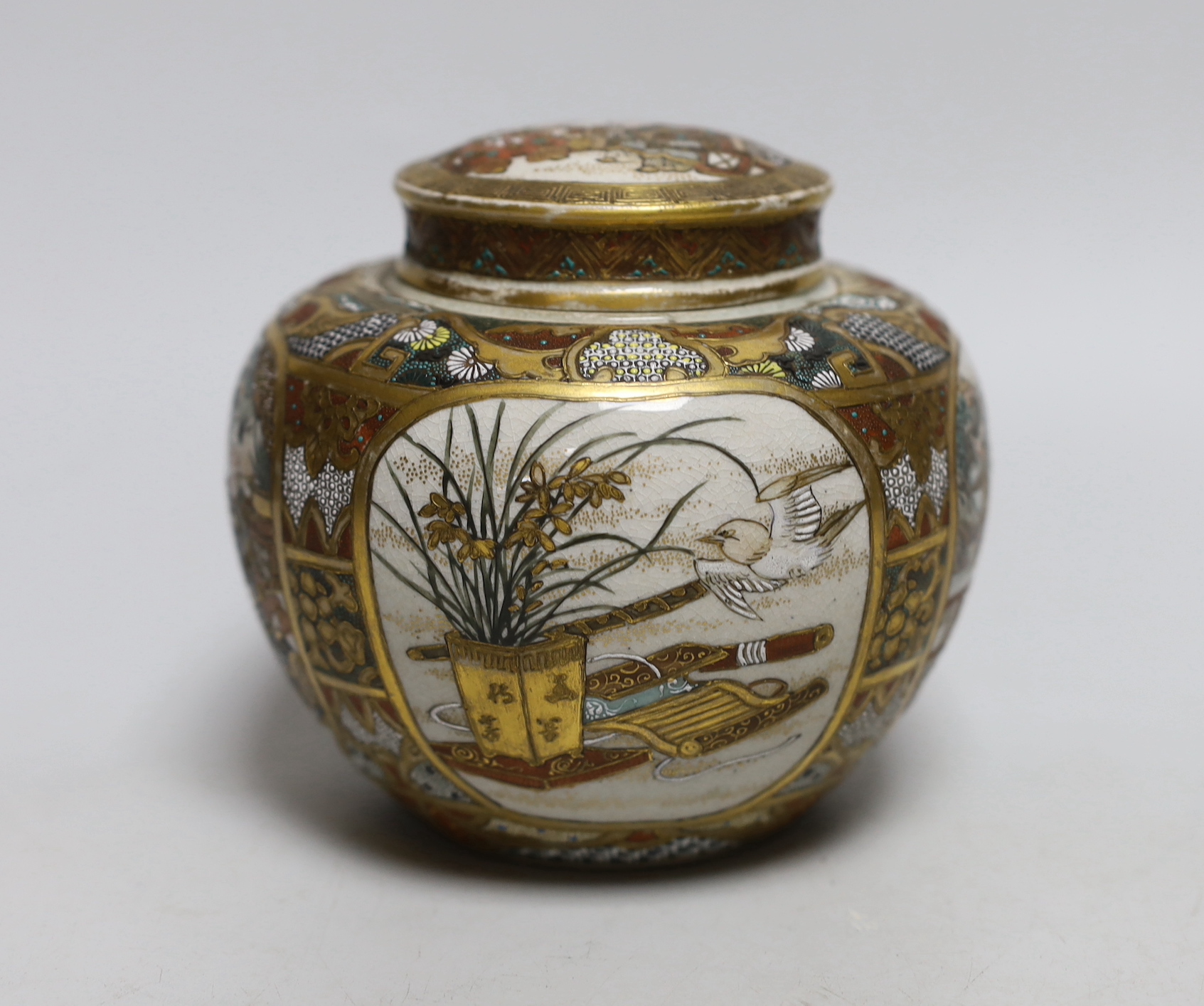 A Japanese Satsuma lidded jar and cover, 12cm high                                                                                                                                                                          