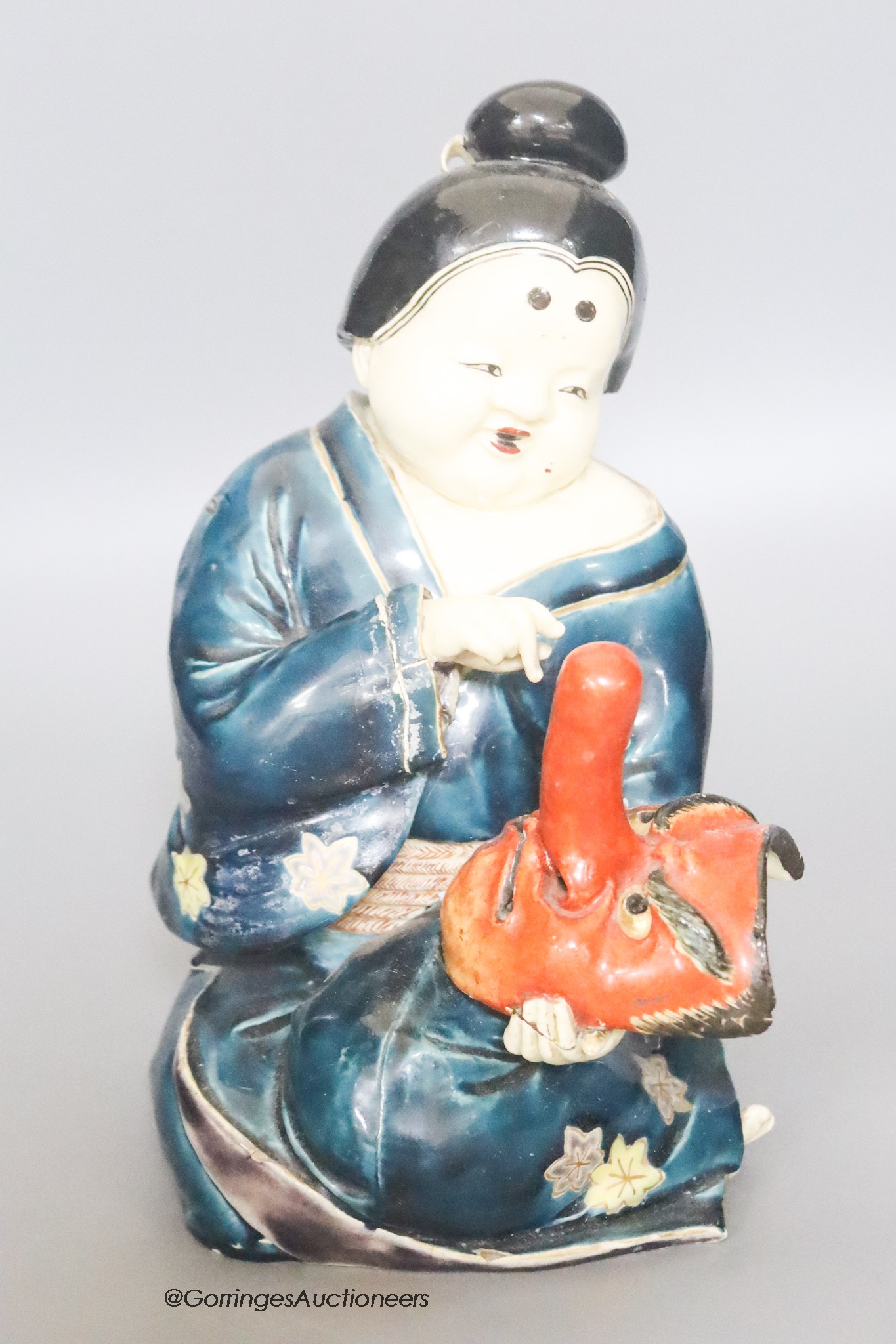 A 19th century Japanese Kutani pottery figure of an actress, height 25cm                                                                                                                                                    