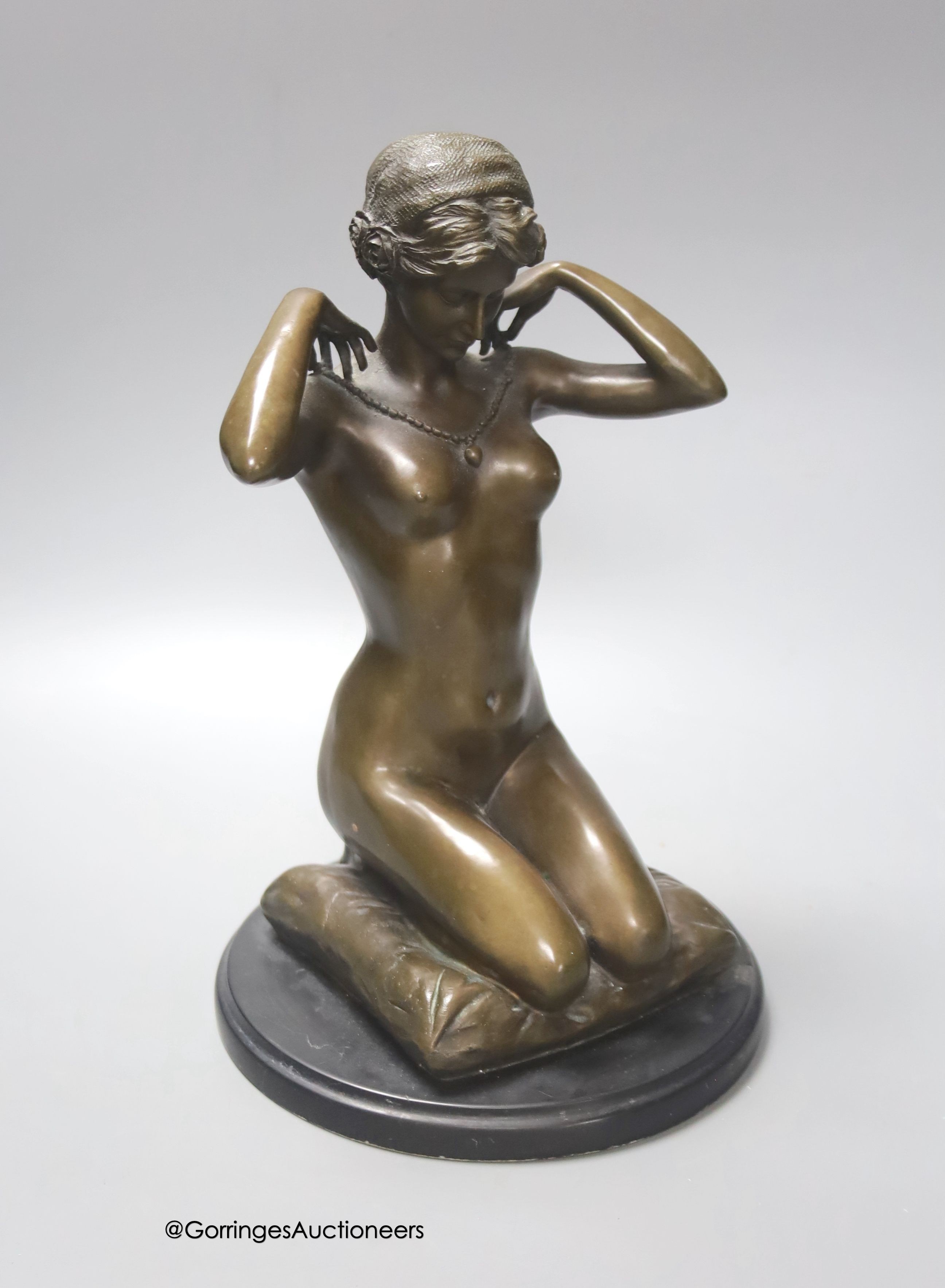 After Ponsard, a bronze of a kneeling nude, height 29cm                                                                                                                                                                     