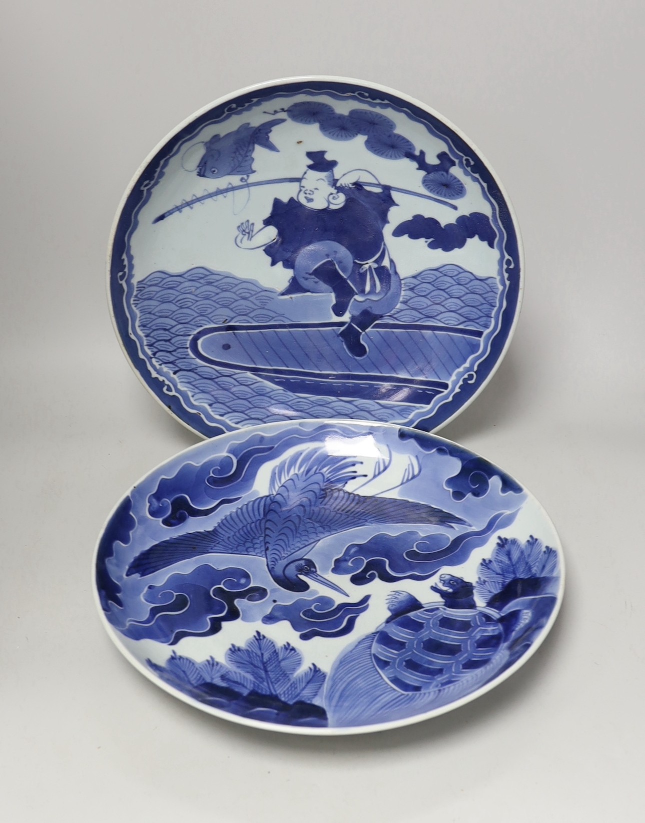 Two Japanese blue and white dishes, late Edo period, 33cm diameter, one with apocryphal Chenghua mark                                                                                                                       
