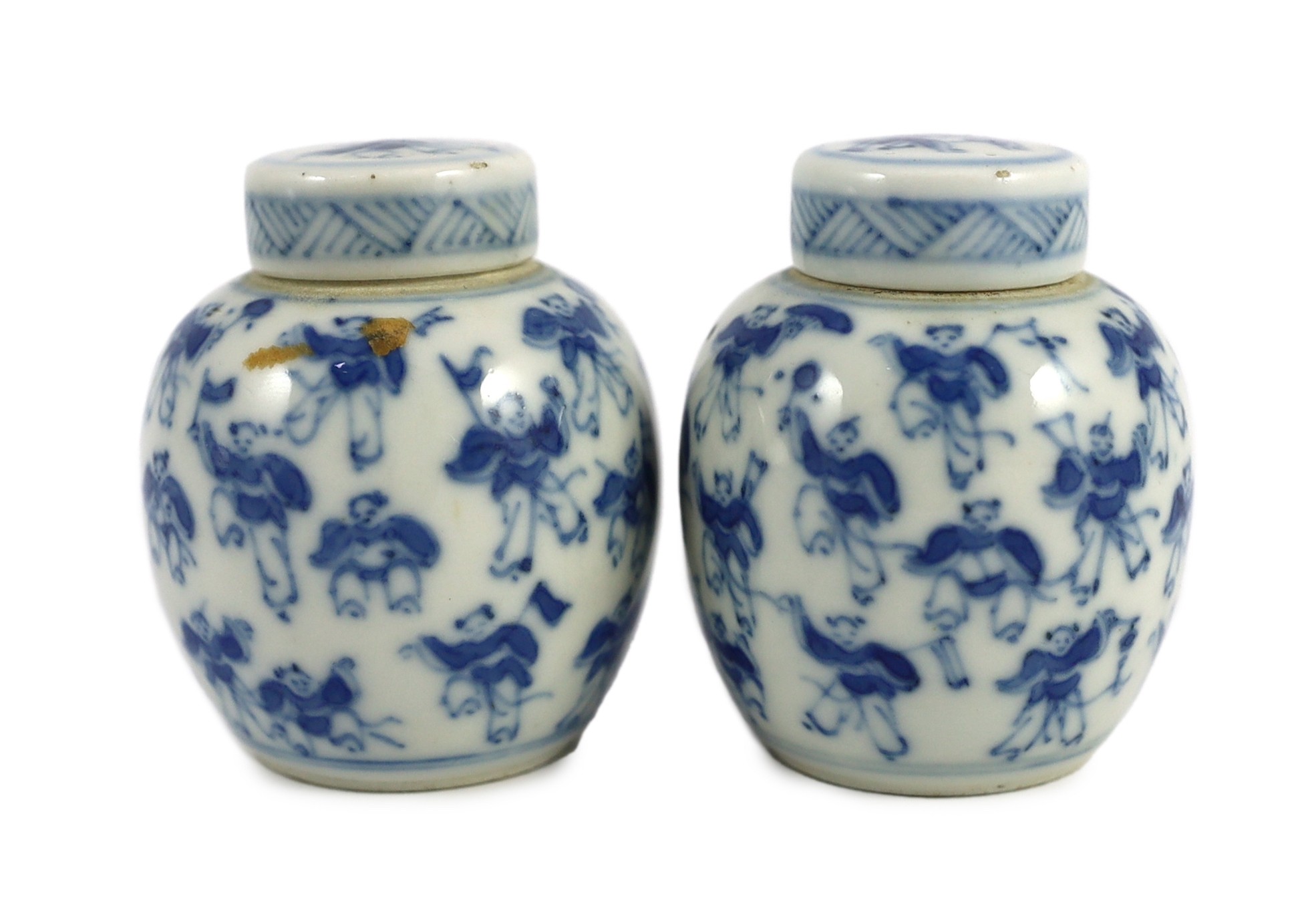 A pair of 19th century Chinese blue and white boys miniature jars and covers, 5.5 cm high                                                                                                                                   