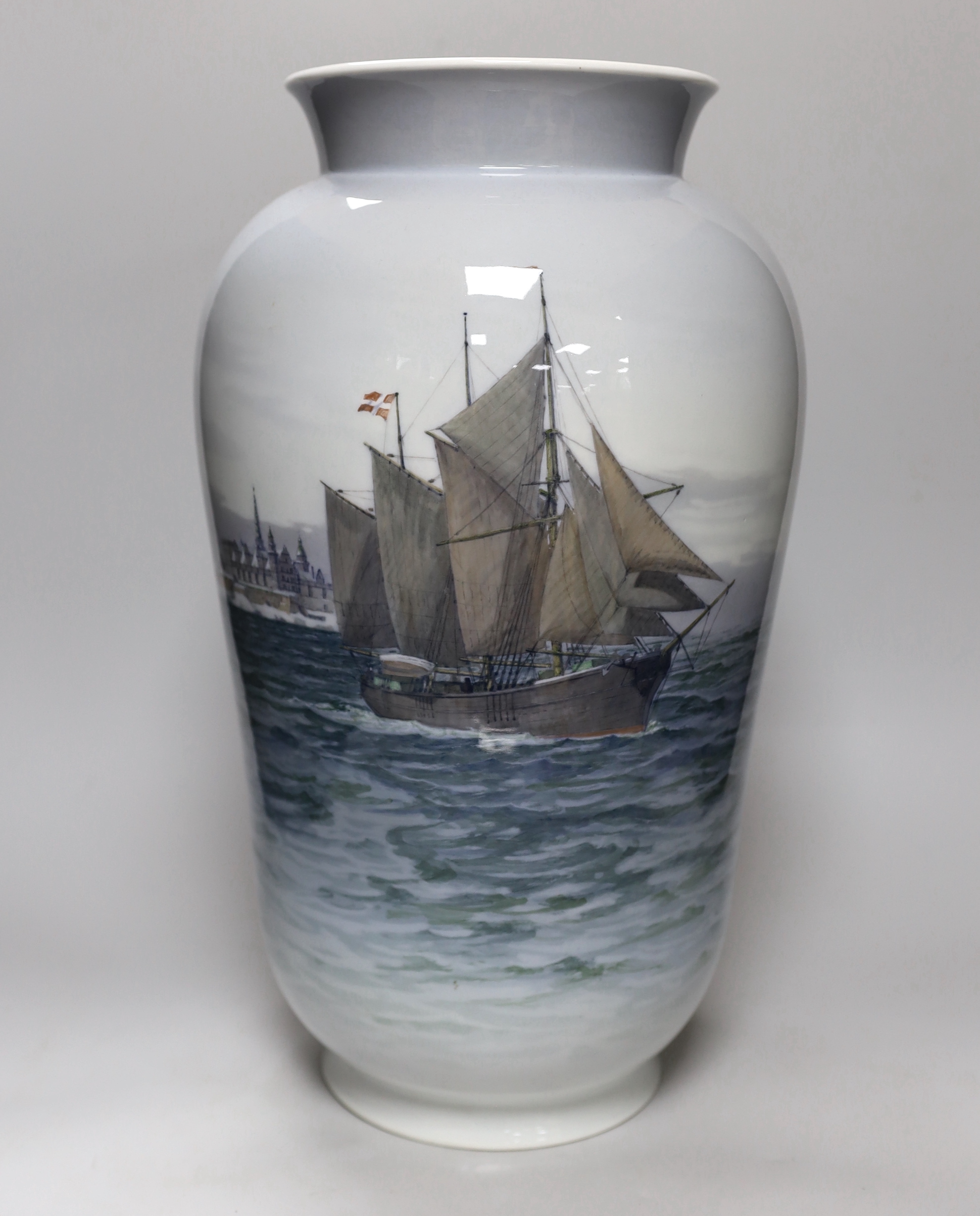 A large Royal Copenhagen vase with shipping scene, painted by Theodor Kjølner and dated 1938, height 44.5cm                                                                                                                 