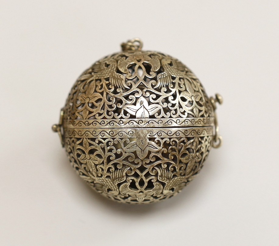 A Chinese spherical ornately worked metal perfume holder, 5.2cm                                                                                                                                                             