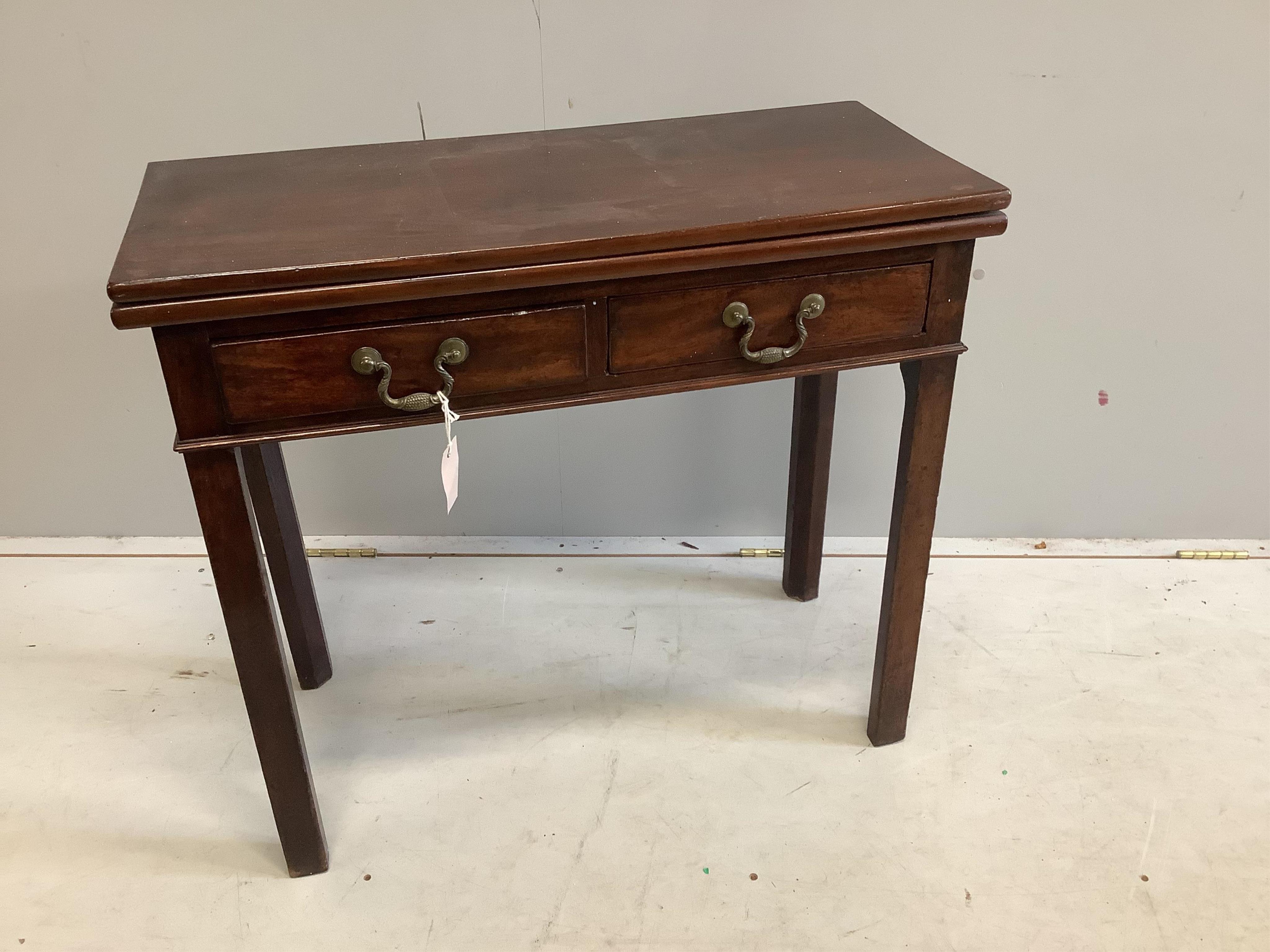 A George III rectangular mahogany folding tea table, width 80cm, depth 36cm, height 72cm. Condition - fair                                                                                                                  