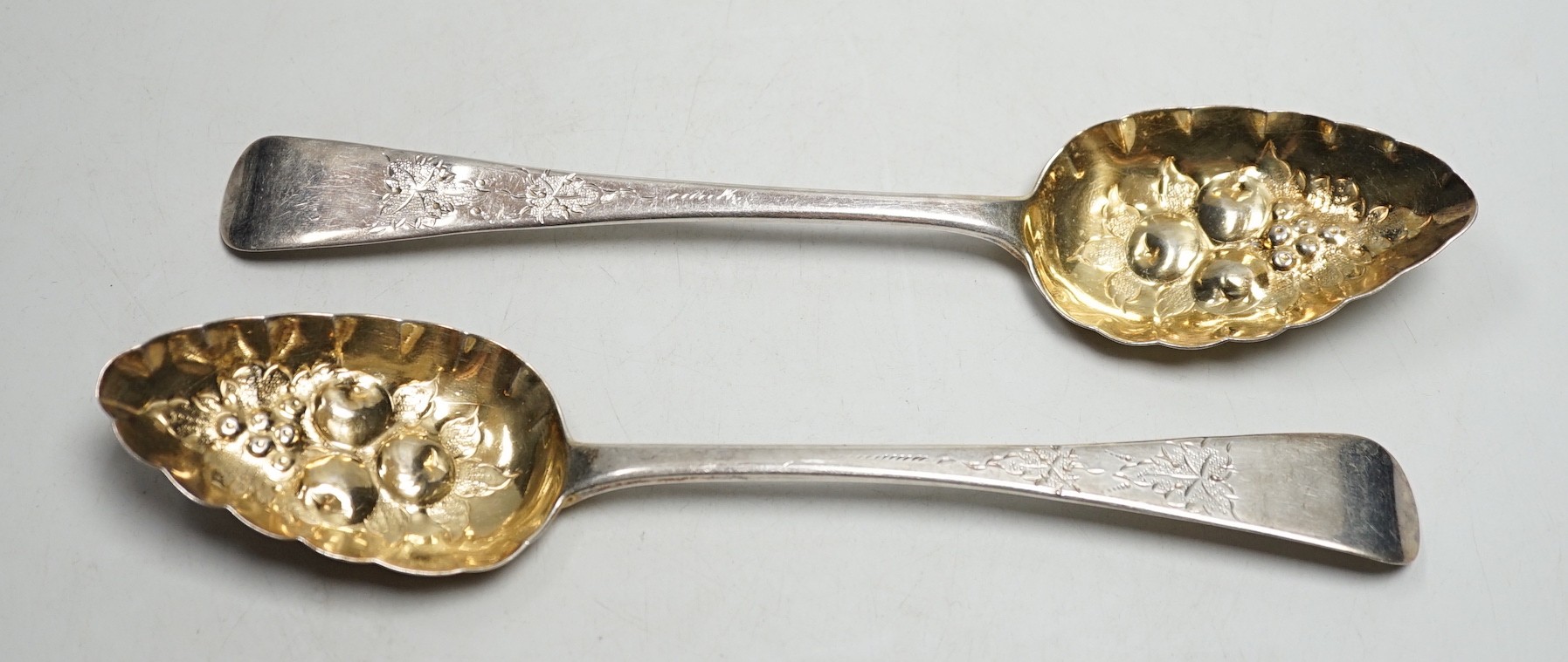 A pair of George IV silver Old English pattern 'berry' spoons, William Scofield, London, 1826, 22.5cm, 4.1oz.                                                                                                               